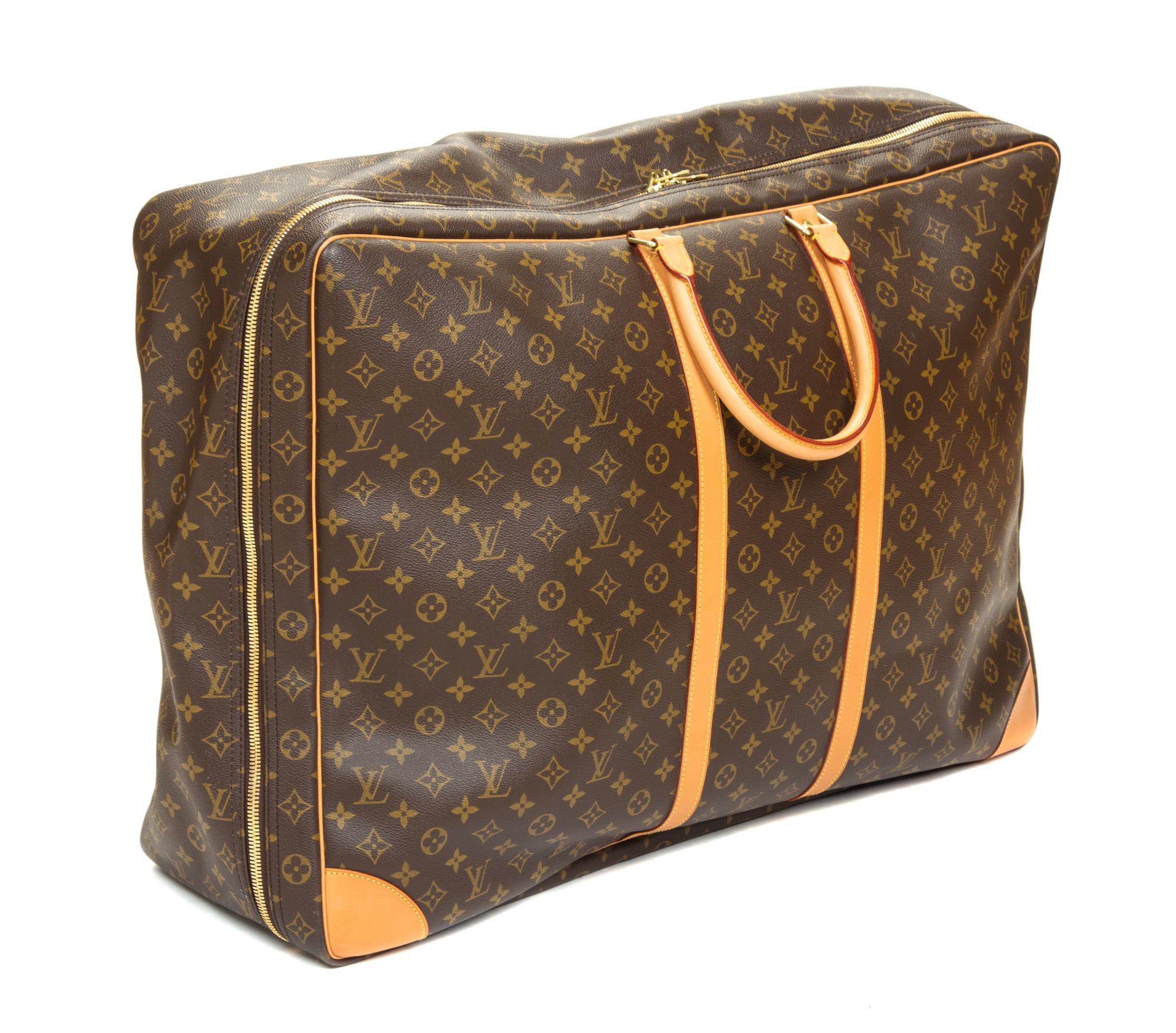A Louis Vuitton Monogram Canvas Sirius Soft Sided Suitcase, 19"H x 27.5"W x 8.25"D; Handle drop: 4.5".