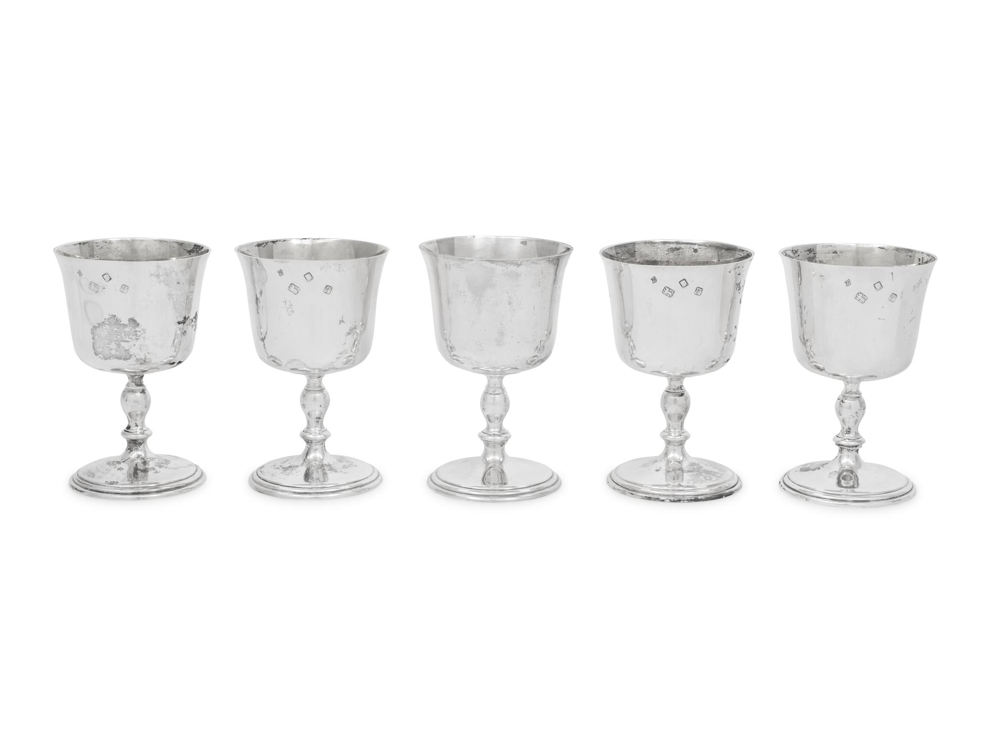 A Set of Five English Silver Goblets