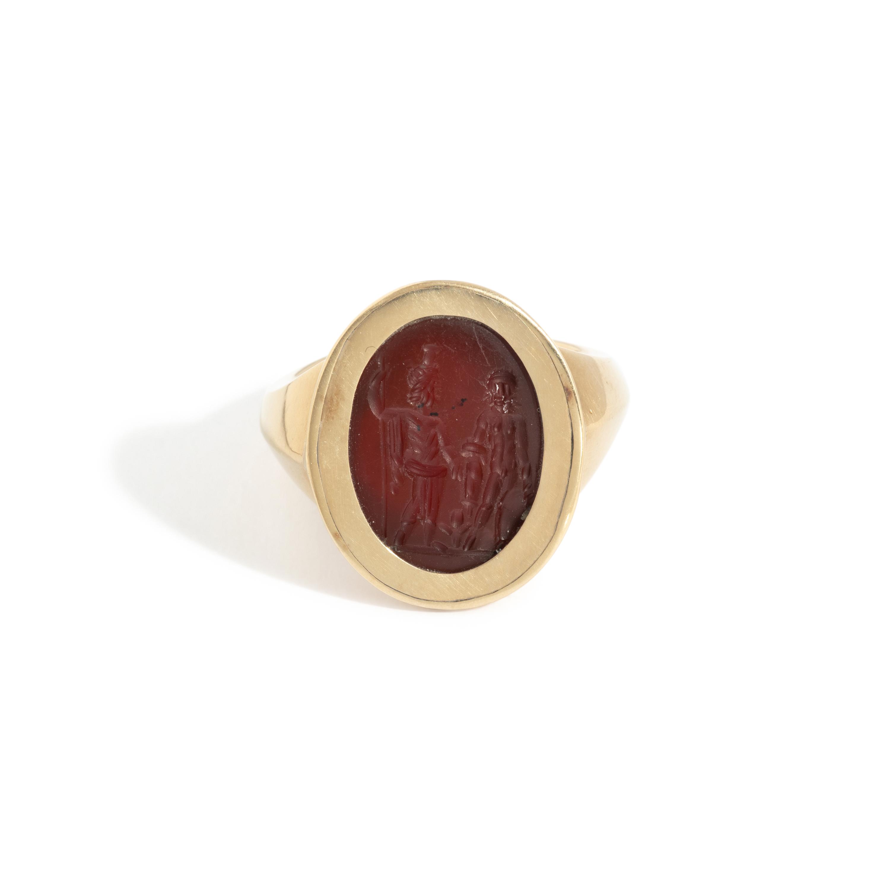 A Roman Carnelian Ring Stone with Two Male Deities and a Child — Set in a gold ring
