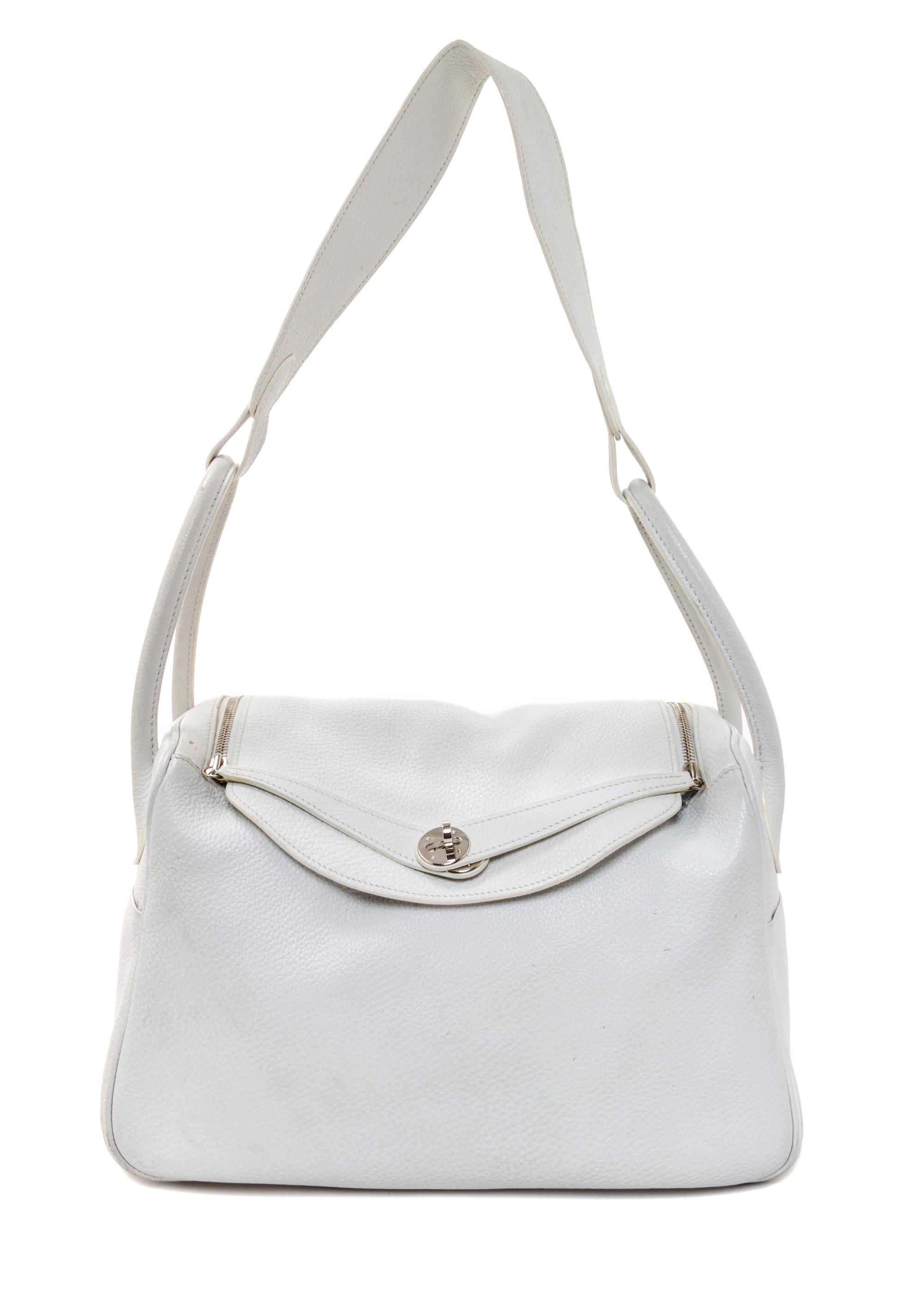 An Hermes White Taurillon Clemence Lindy 34 Handbag, 13.5" x 8" x 7".
