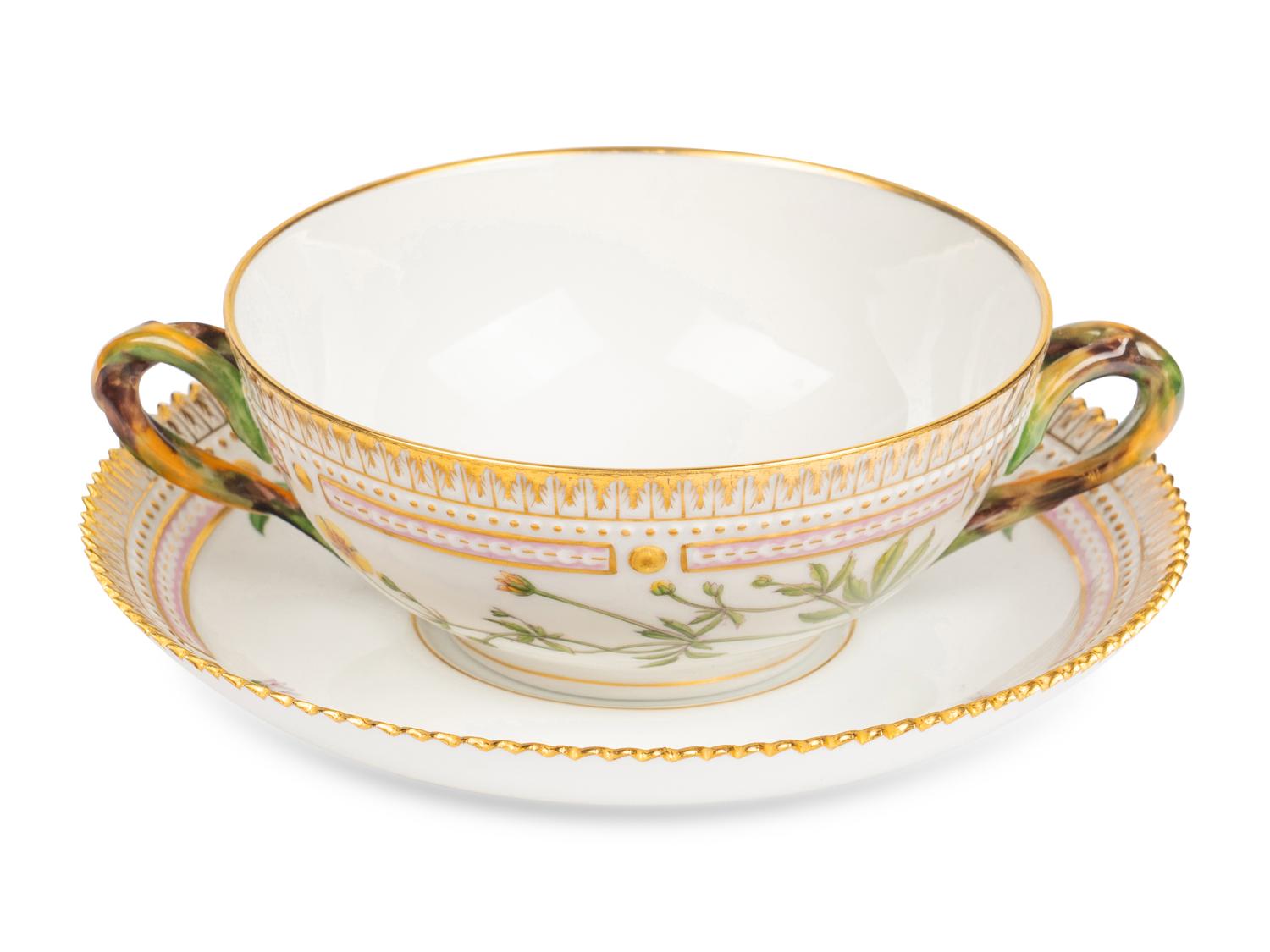 A Set of Twelve Royal Copenhagen Flora Danica Porcelain Bouillon Cups and Stands