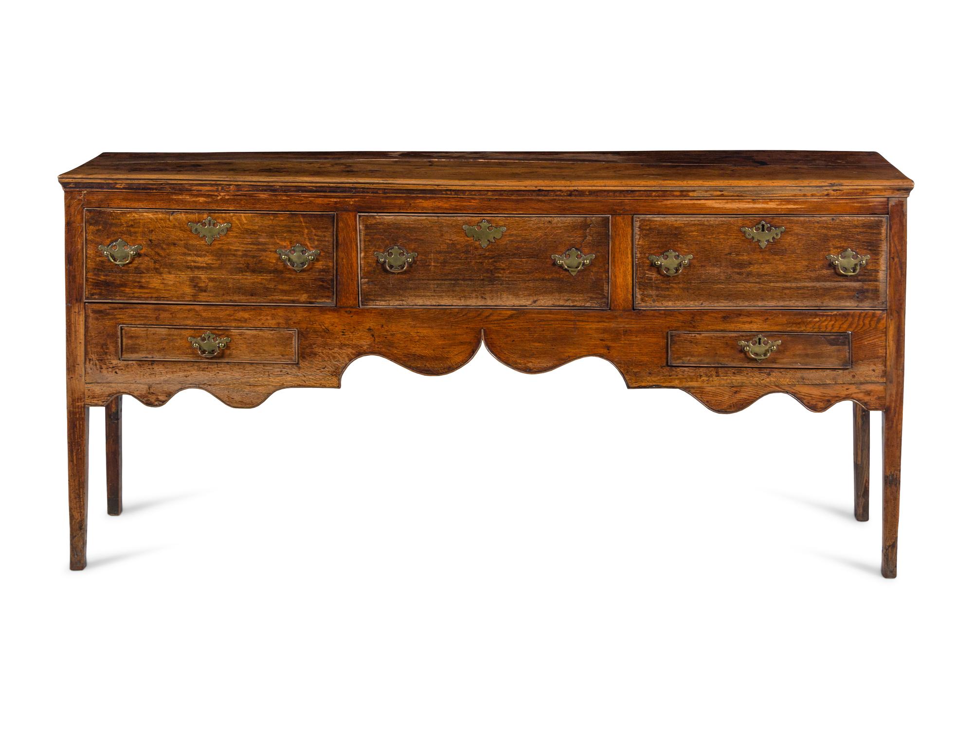 A George III Style Carved Oak Sideboard