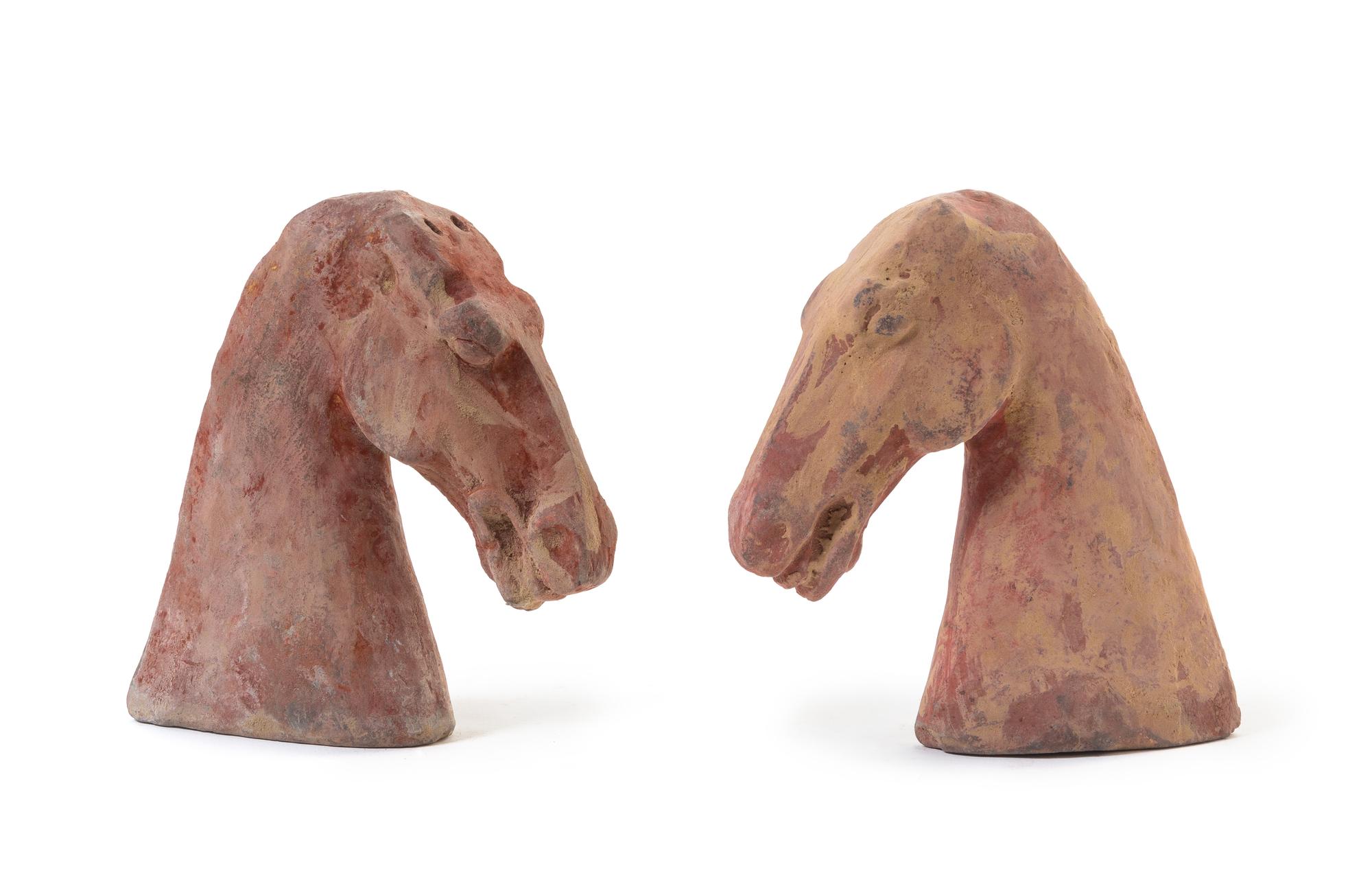 Two Pottery Heads of Horses — HAN DYNASTY