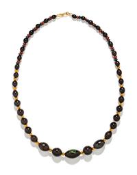 An Egyptian Hematite and Gold Bead Necklace