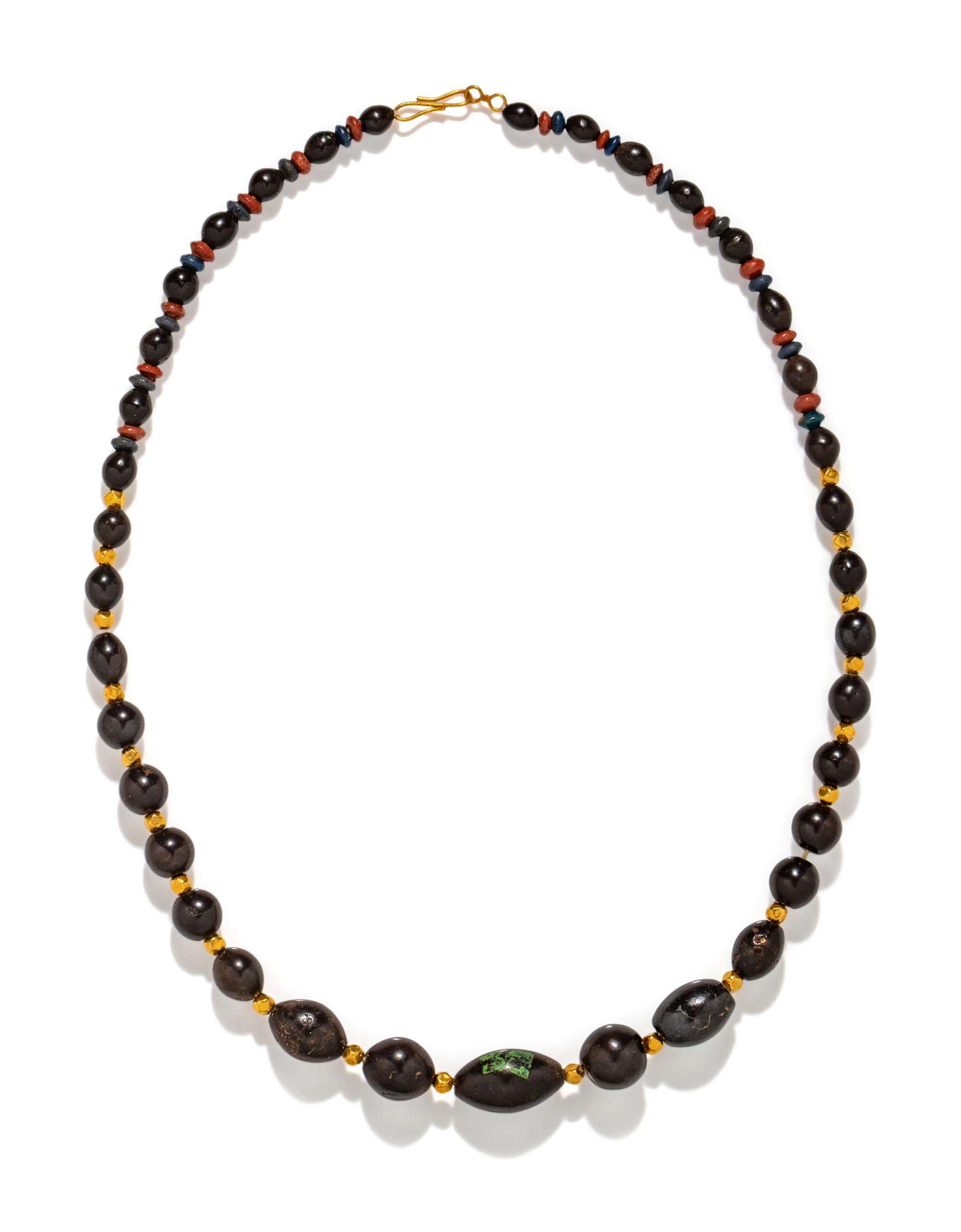 An Egyptian Hematite and Gold Bead Necklace