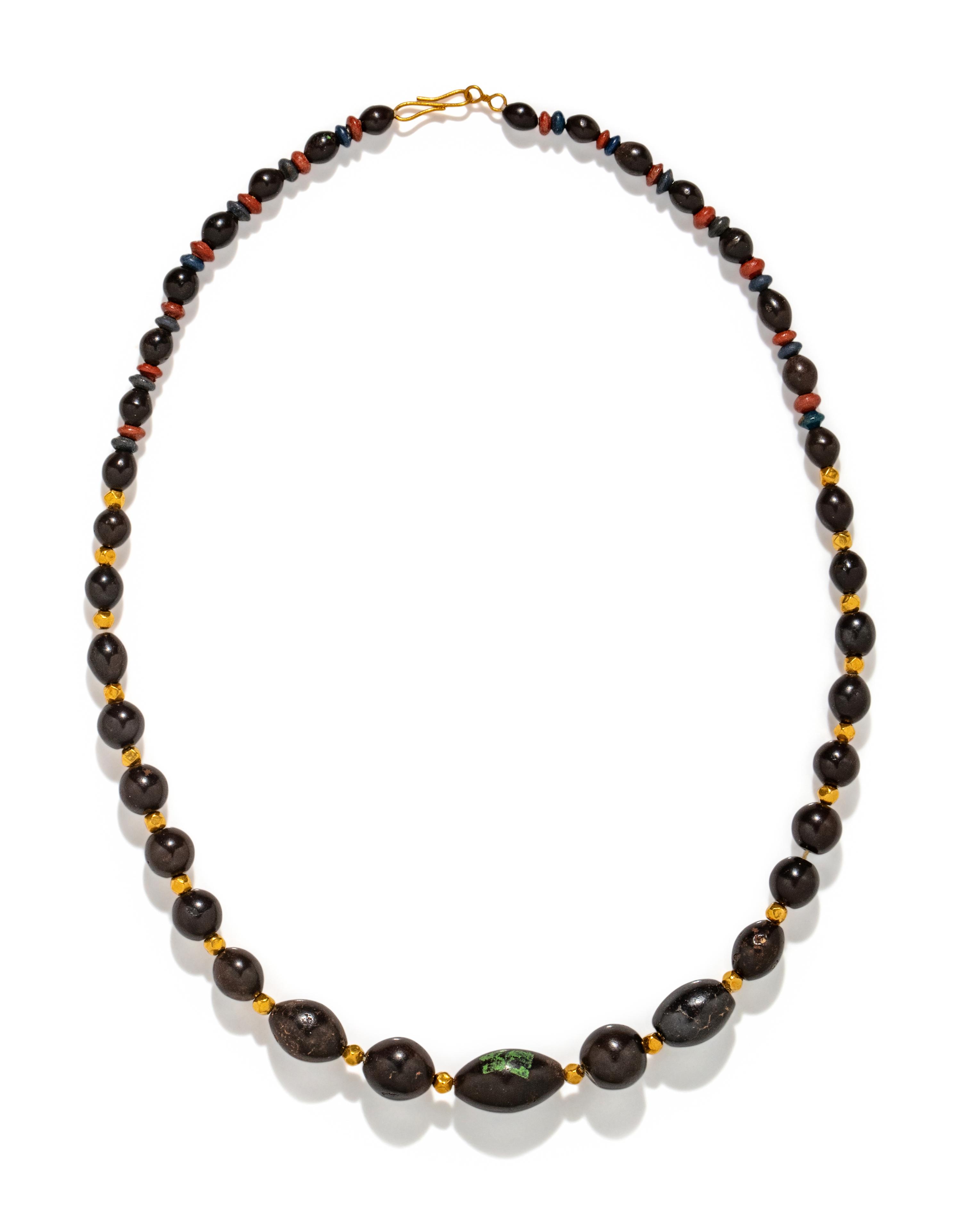 An Egyptian Hematite and Gold Bead Necklace