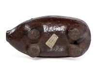 An Ohio Brown-Glazed Sewer Tile Pig