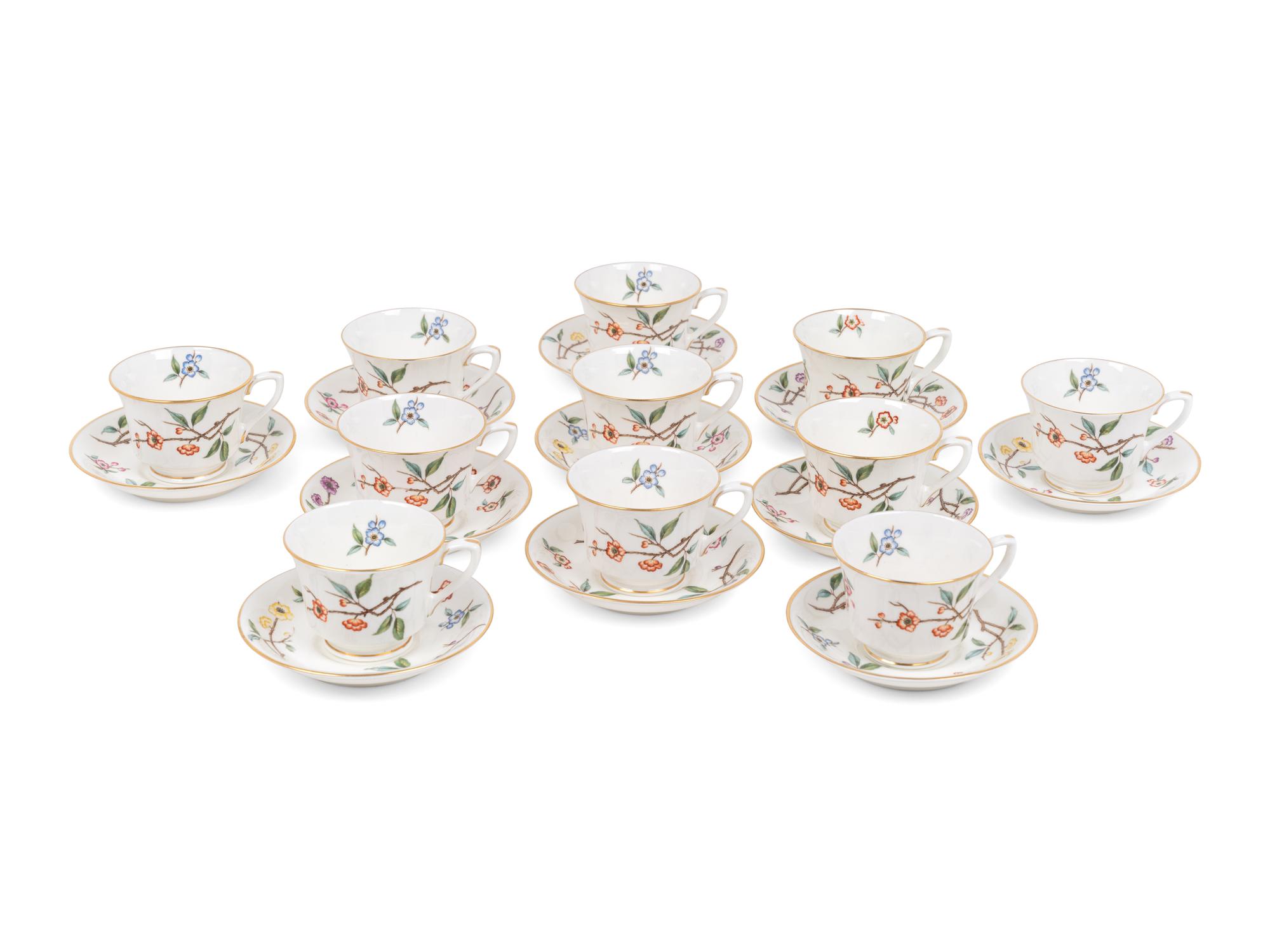 A Set of Eleven Royal Worcester Porcelain Teacups and Saucers