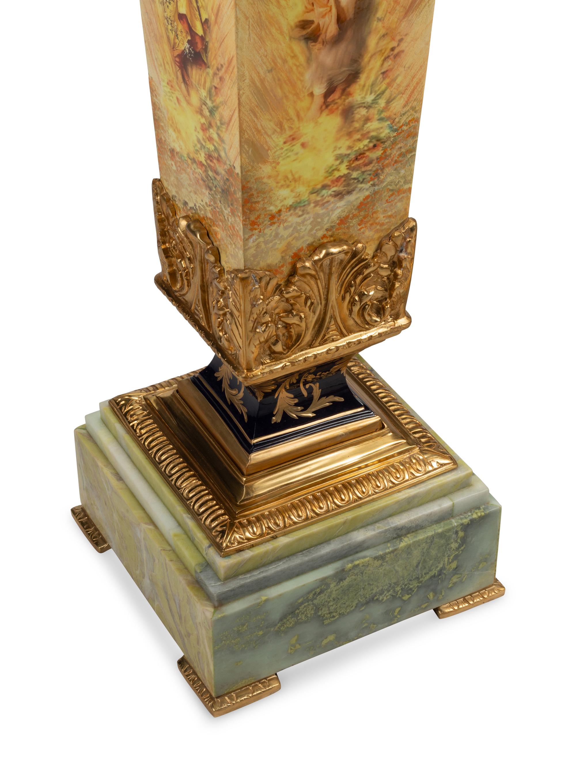 A Pair of Napoleon III Style Gilt Metal Mounted Marble and Metal Pedestals