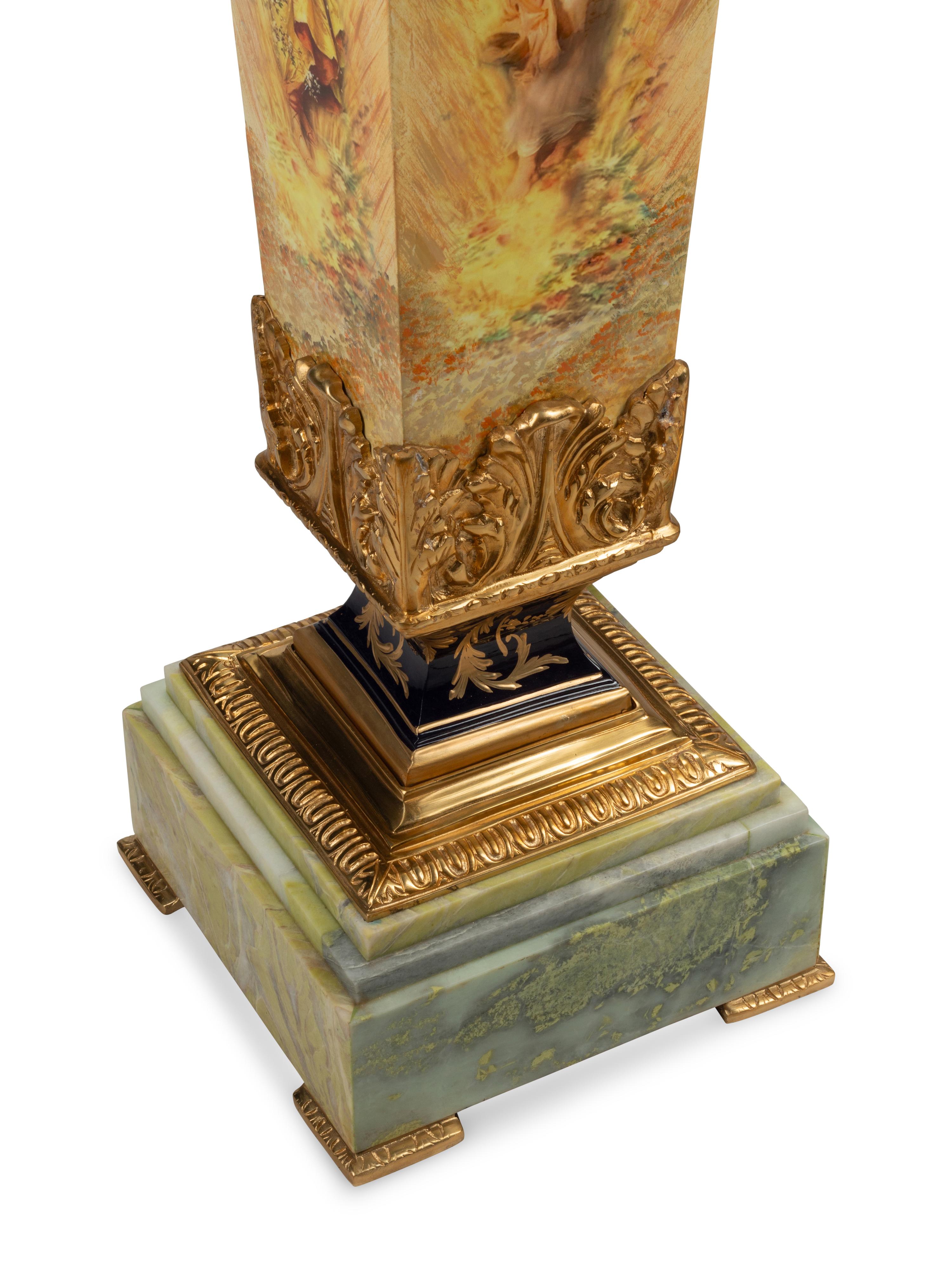 A Pair of Napoleon III Style Gilt Metal Mounted Marble and Metal Pedestals