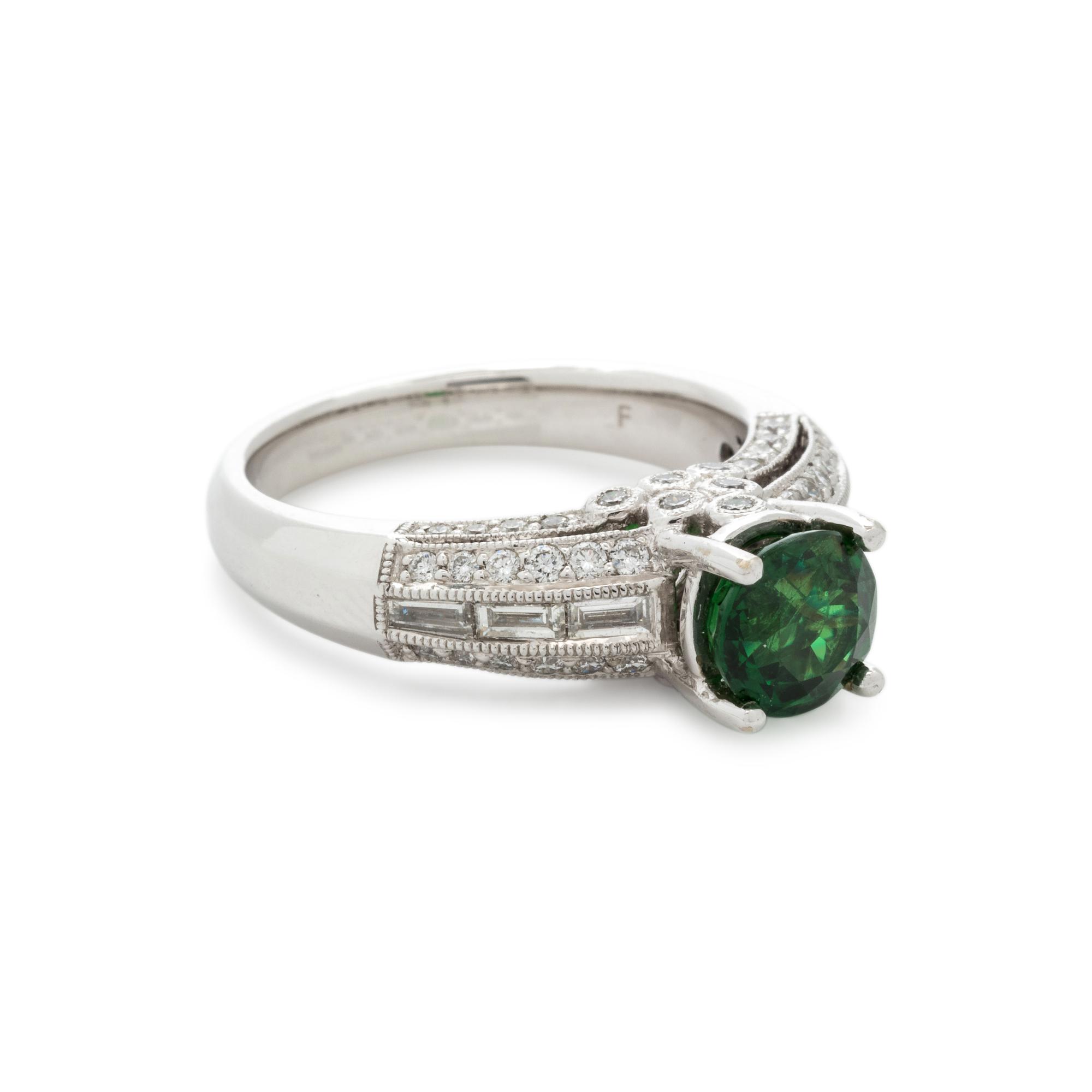 TSAVORITE GARNET AND DIAMOND RING