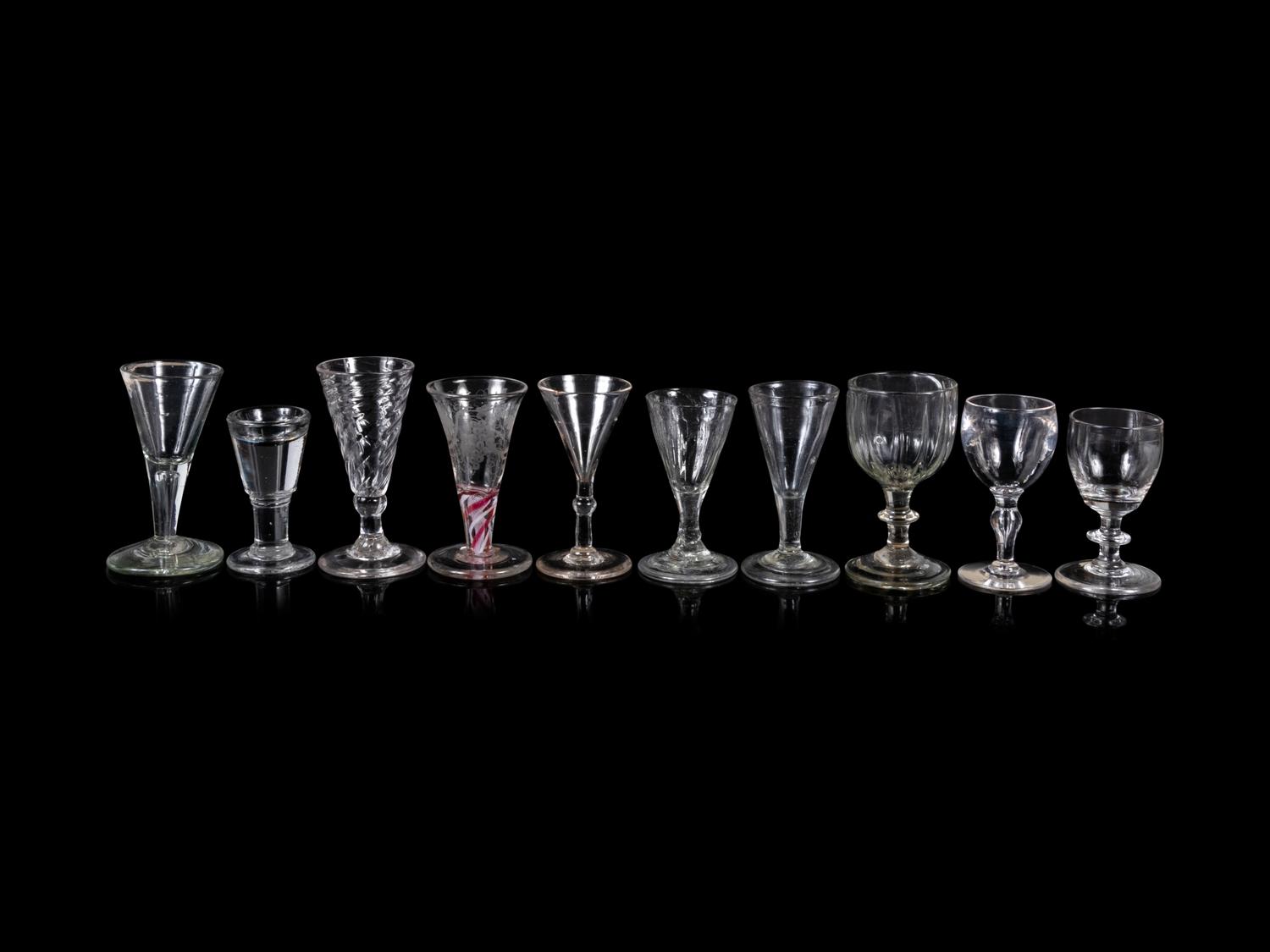 A Collection of Thirteen Assorted Glass Wine and Cordial Stems