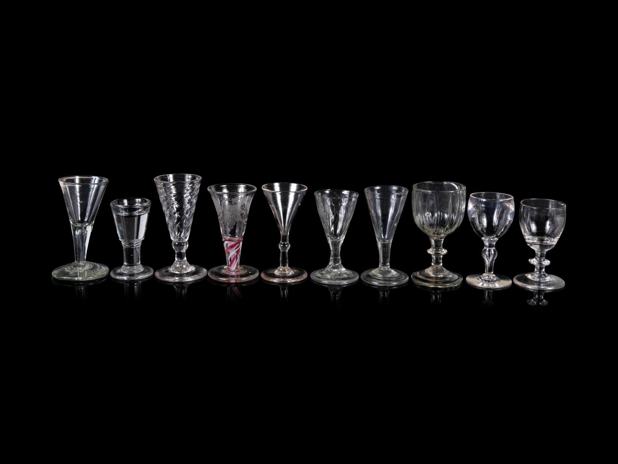 A Collection of Thirteen Assorted Glass Wine and Cordial Stems