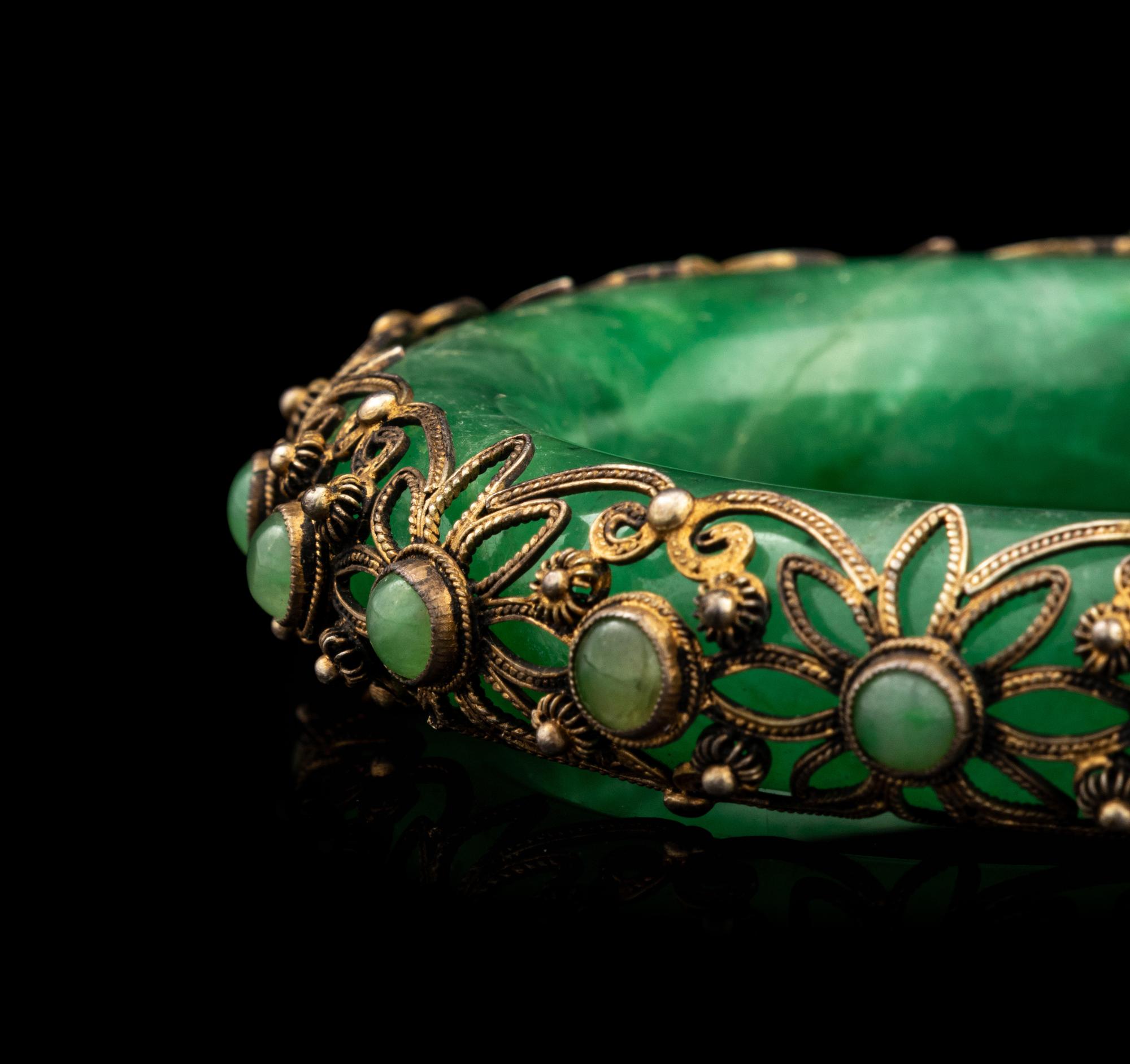 A Chinese Silver Mounted Jadeite Bangle