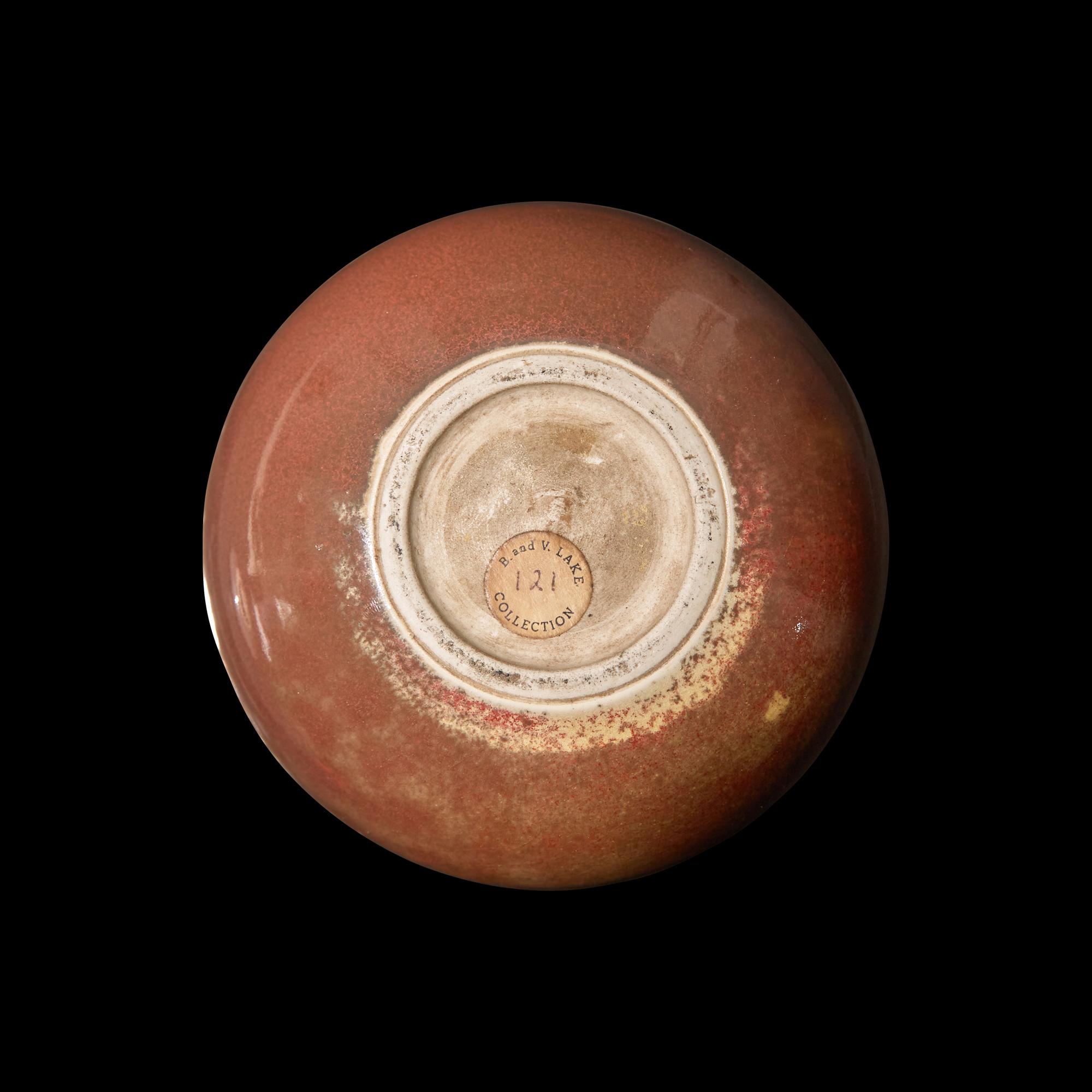 A Chinese Teardrop-Form Porcelain Vase and a Red Glazed Dish, Possibly Jin Dynasty and Later 金或更晚 紅釉瓶及碟