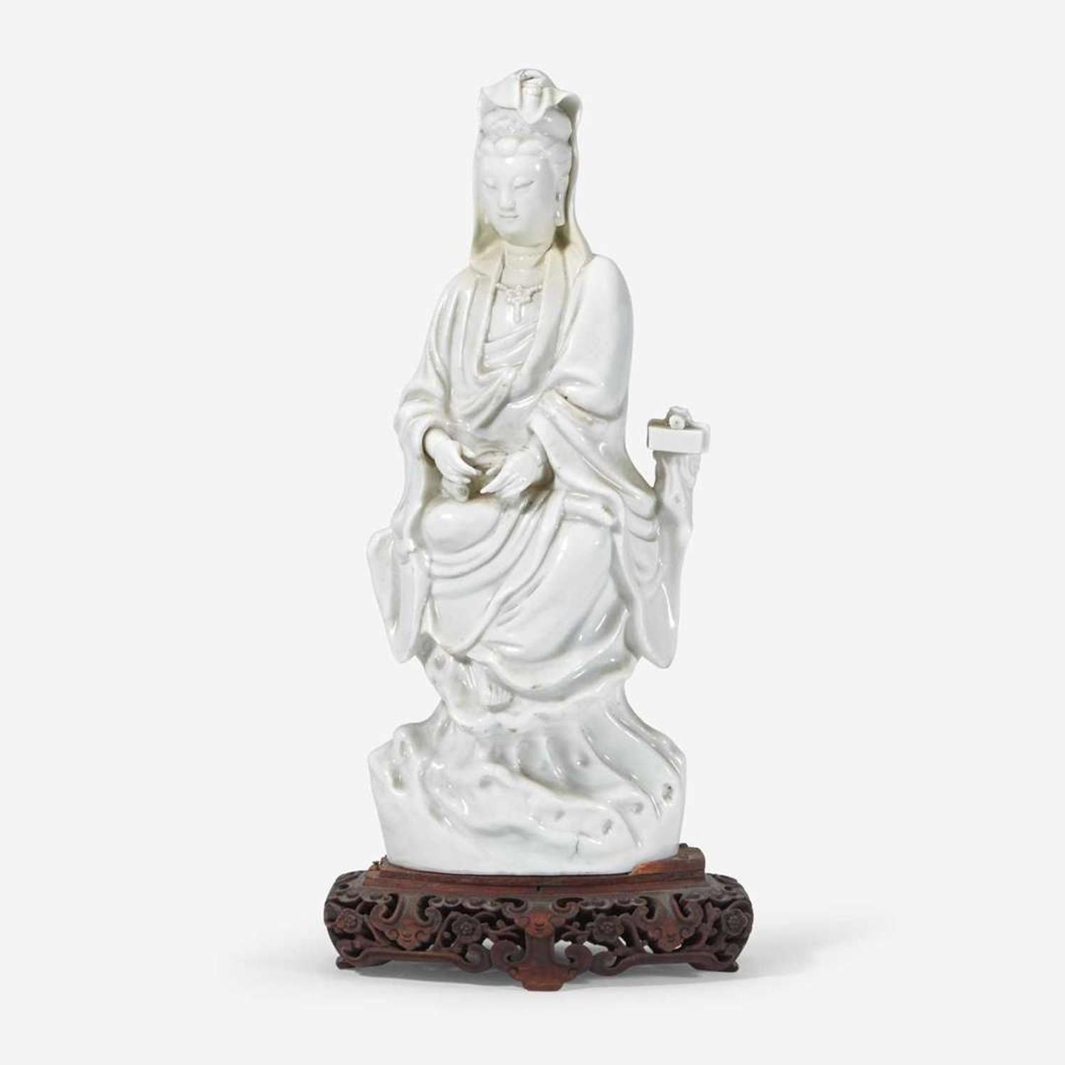 A Chinese Dehua porcelain figure of Guanyin 18th century or earlier