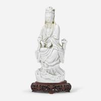 A Chinese Dehua porcelain figure of Guanyin 18th century or earlier