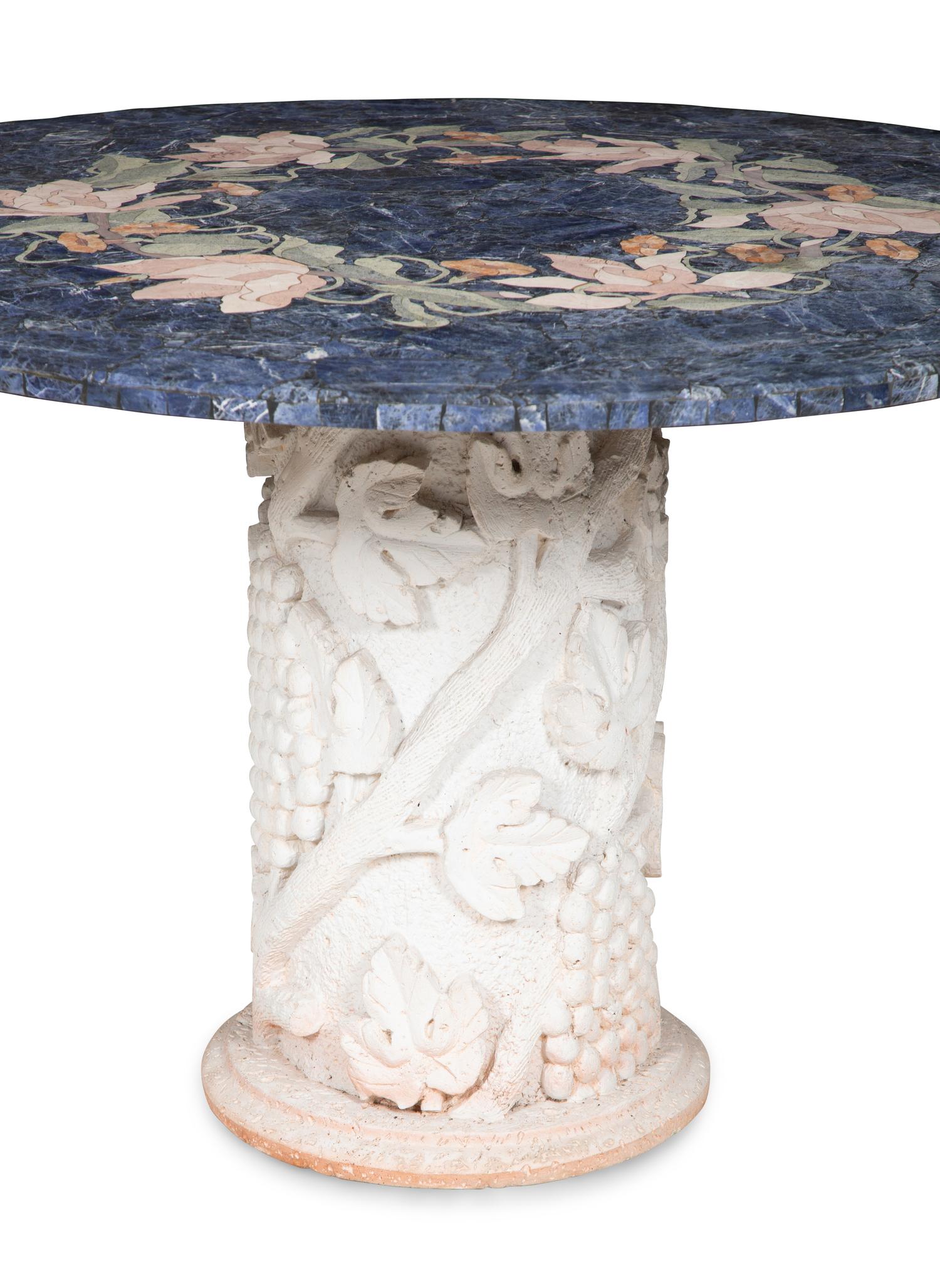 A Cast Stone and Pietra Dura Circular Dining Table