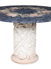 A Cast Stone and Pietra Dura Circular Dining Table