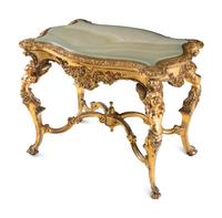 A Continental Rococo Style Giltwood Onyx-Top Table