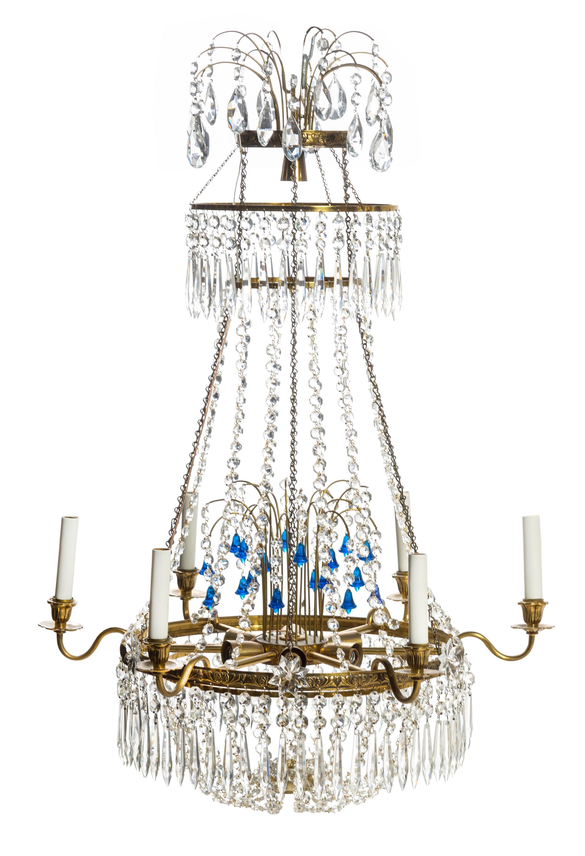 A Baltic Style Gilt Metal Twelve-Light Chandelier Height 38 x diameter 26 inches.
