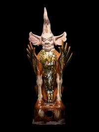 A Chinese Sancai Glazed Pottery Figure of an Earth Spirit, Zhenmushou