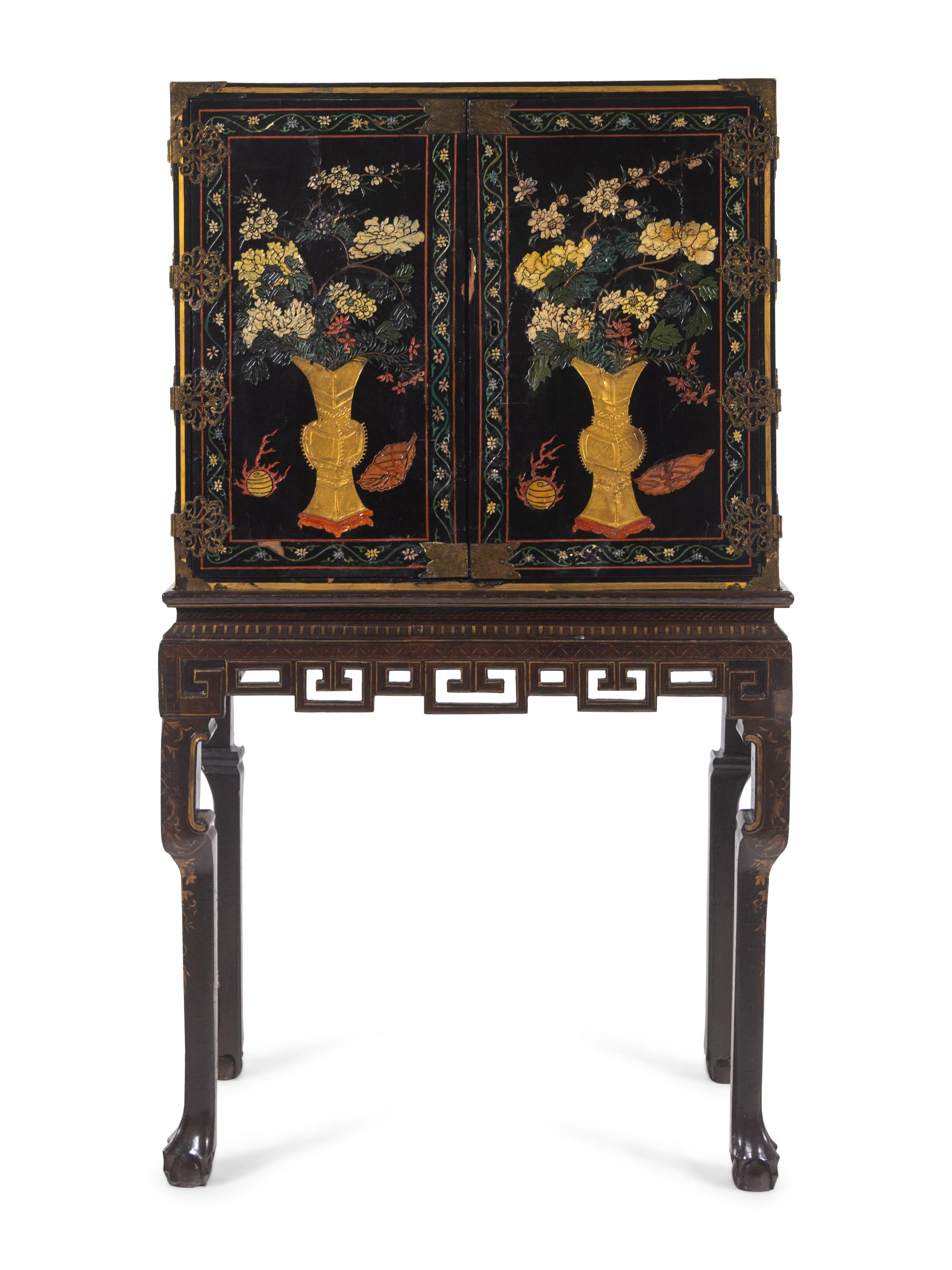 A Chinese Export Lacquer Collector's Cabinet on Stand