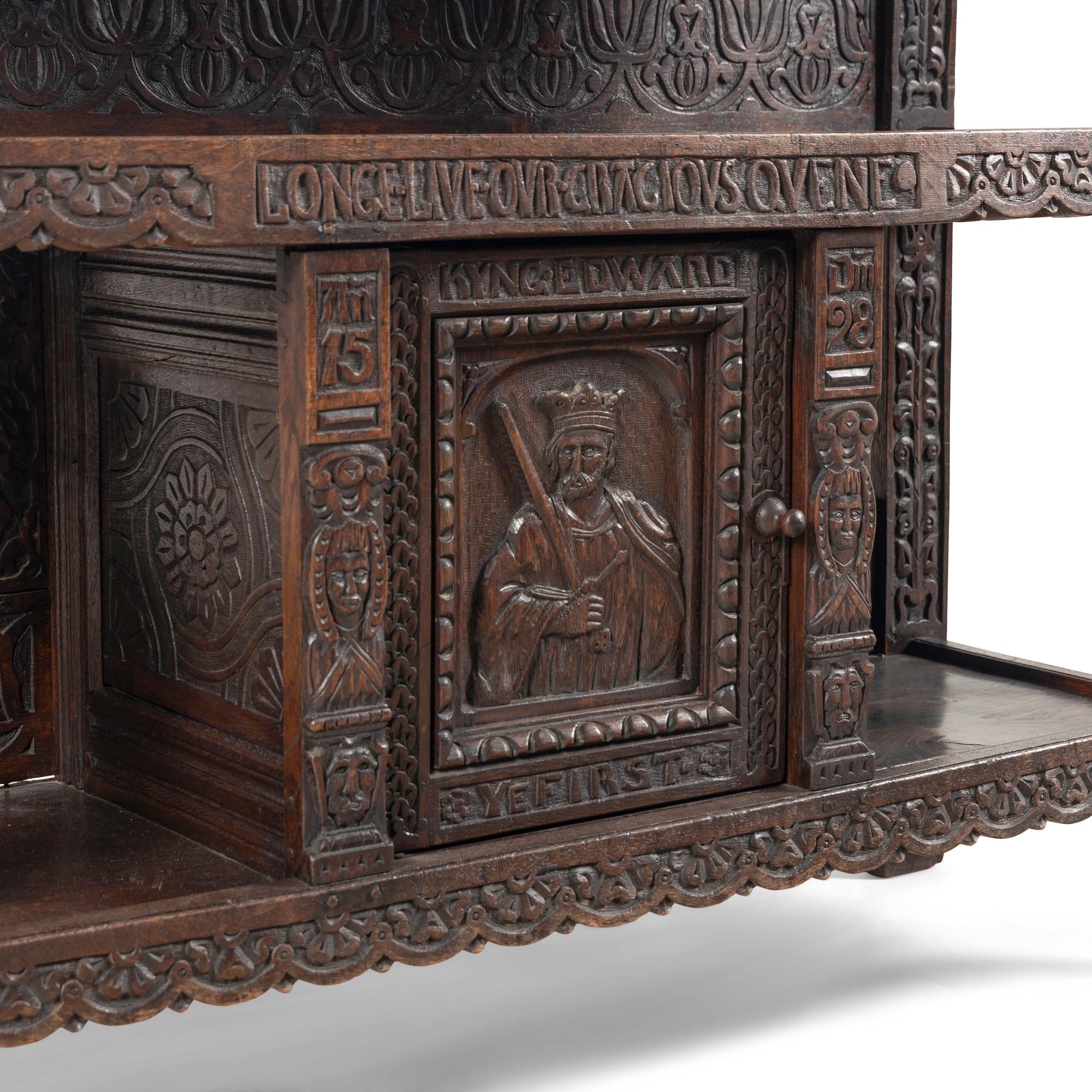 An Elizabethan Style Carved Oak Three-Tier Server