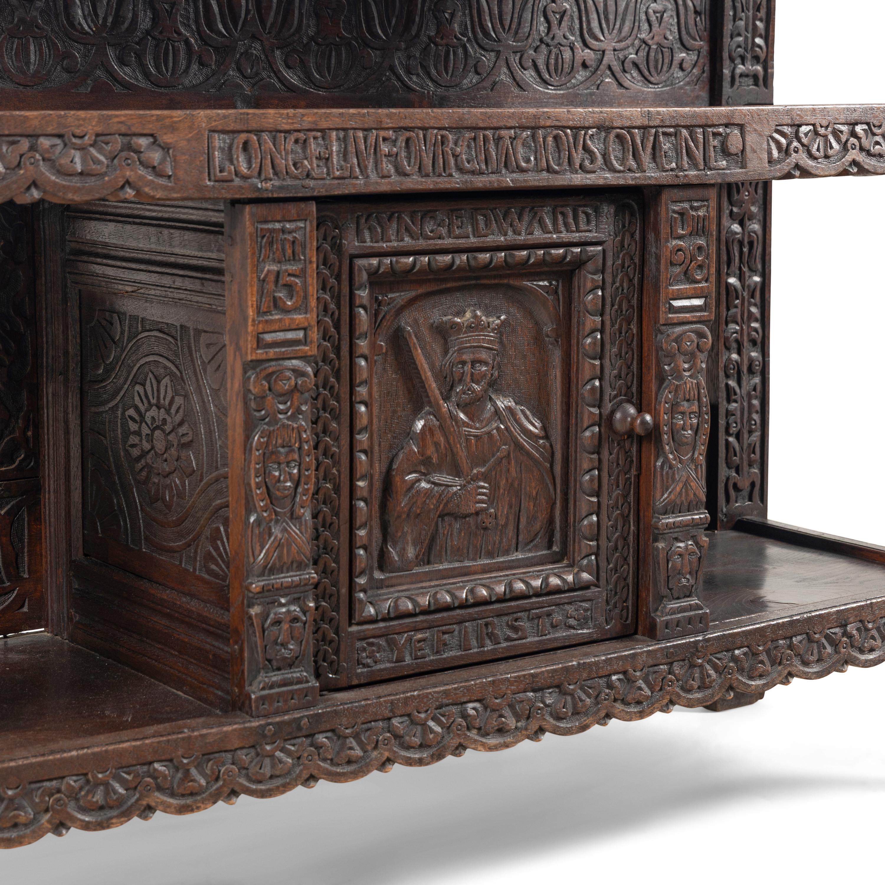 An Elizabethan Style Carved Oak Three-Tier Server