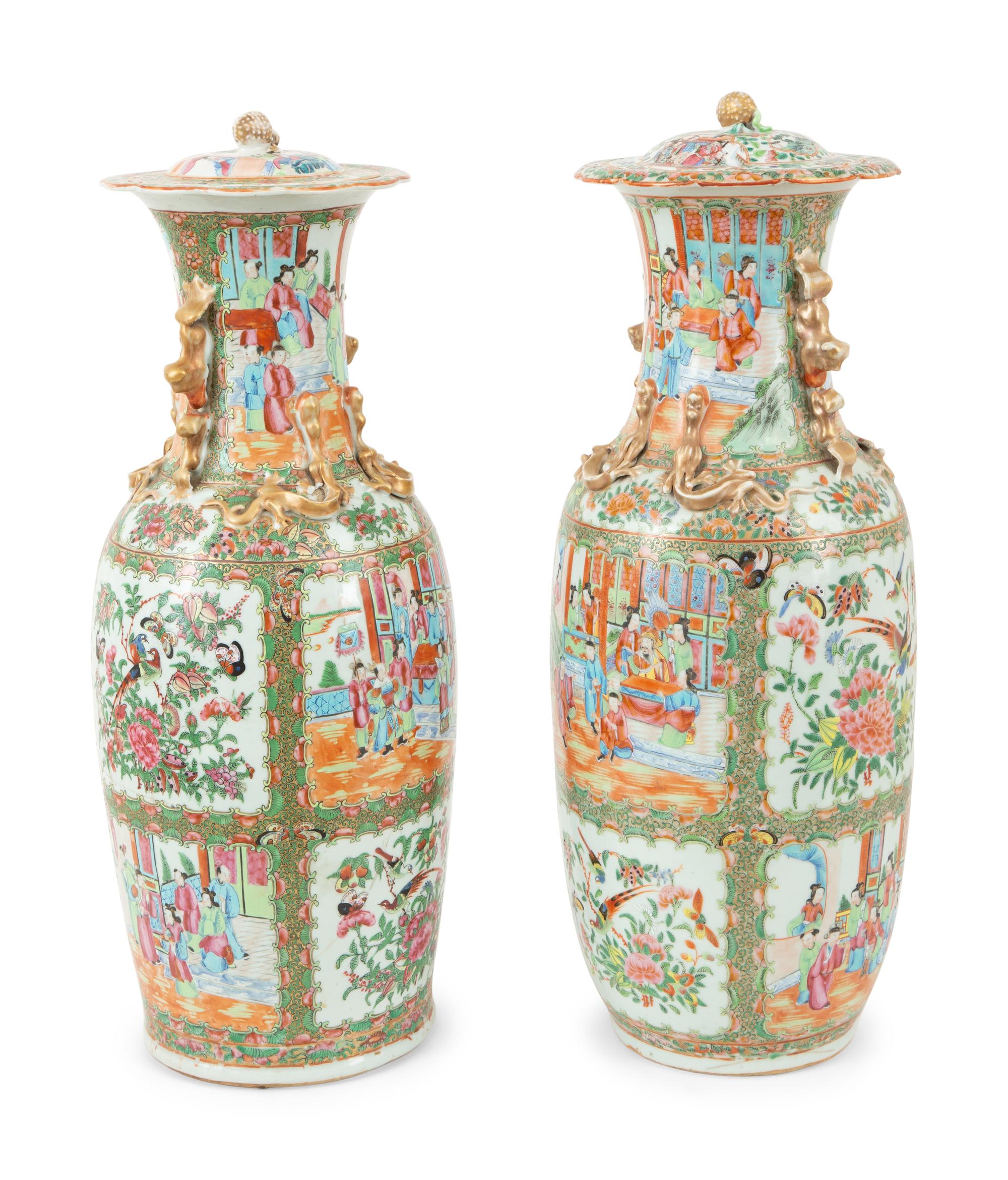 A Pair of Rose Medallion Porcelain Lidded Vases