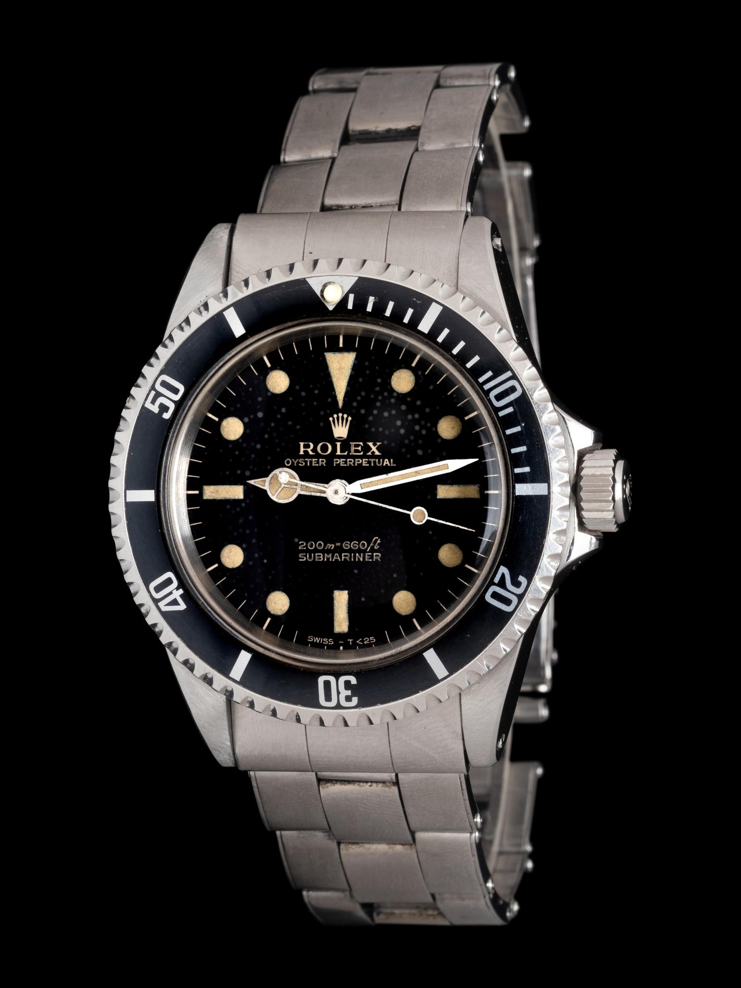 ROLEX, REF. 5513 STAINLESS STEEL TROPICAL GILT 'METERS FIRST SUBMARINER' WATCH