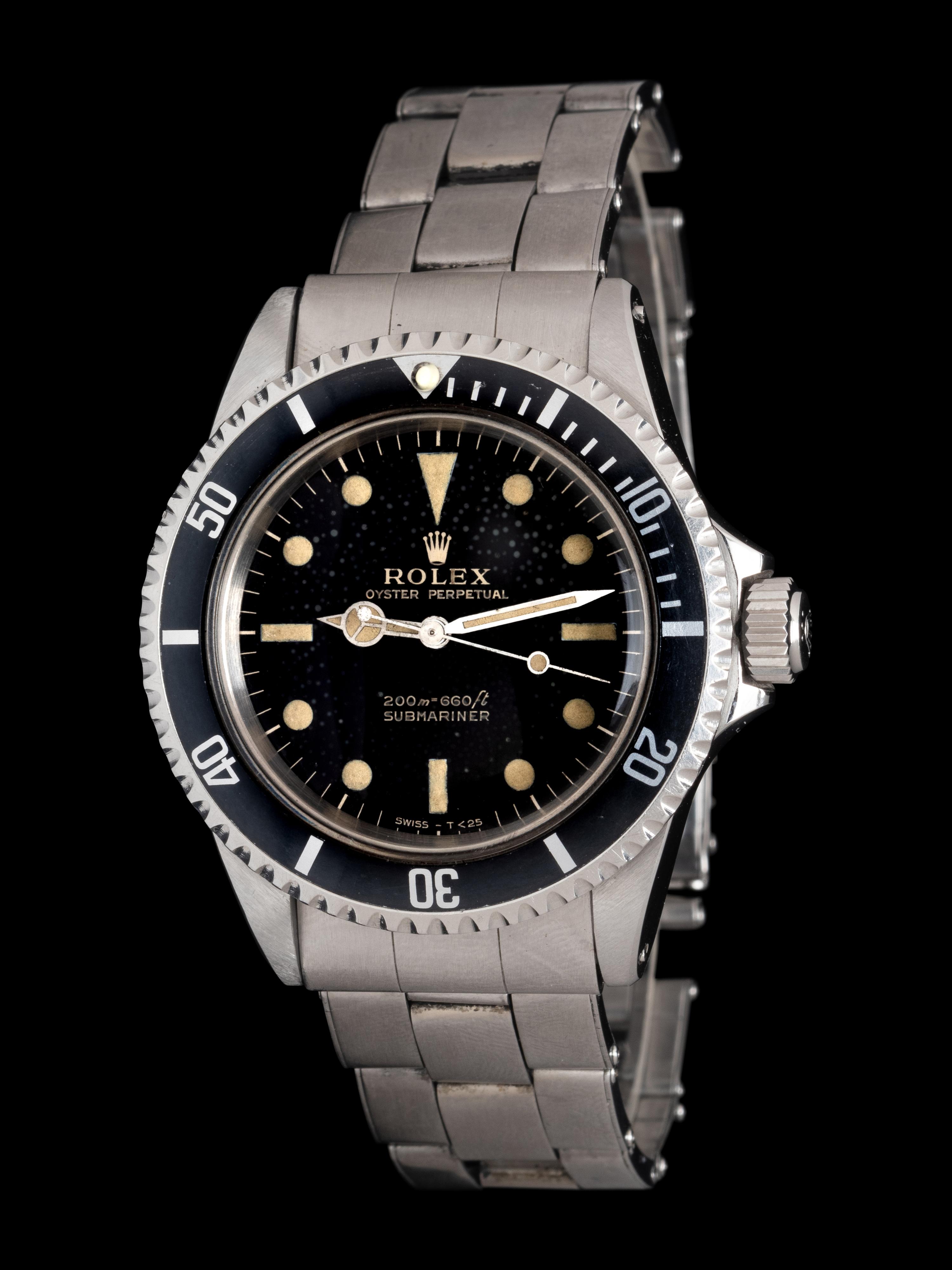 ROLEX, REF. 5513 STAINLESS STEEL TROPICAL GILT 'METERS FIRST SUBMARINER' WATCH