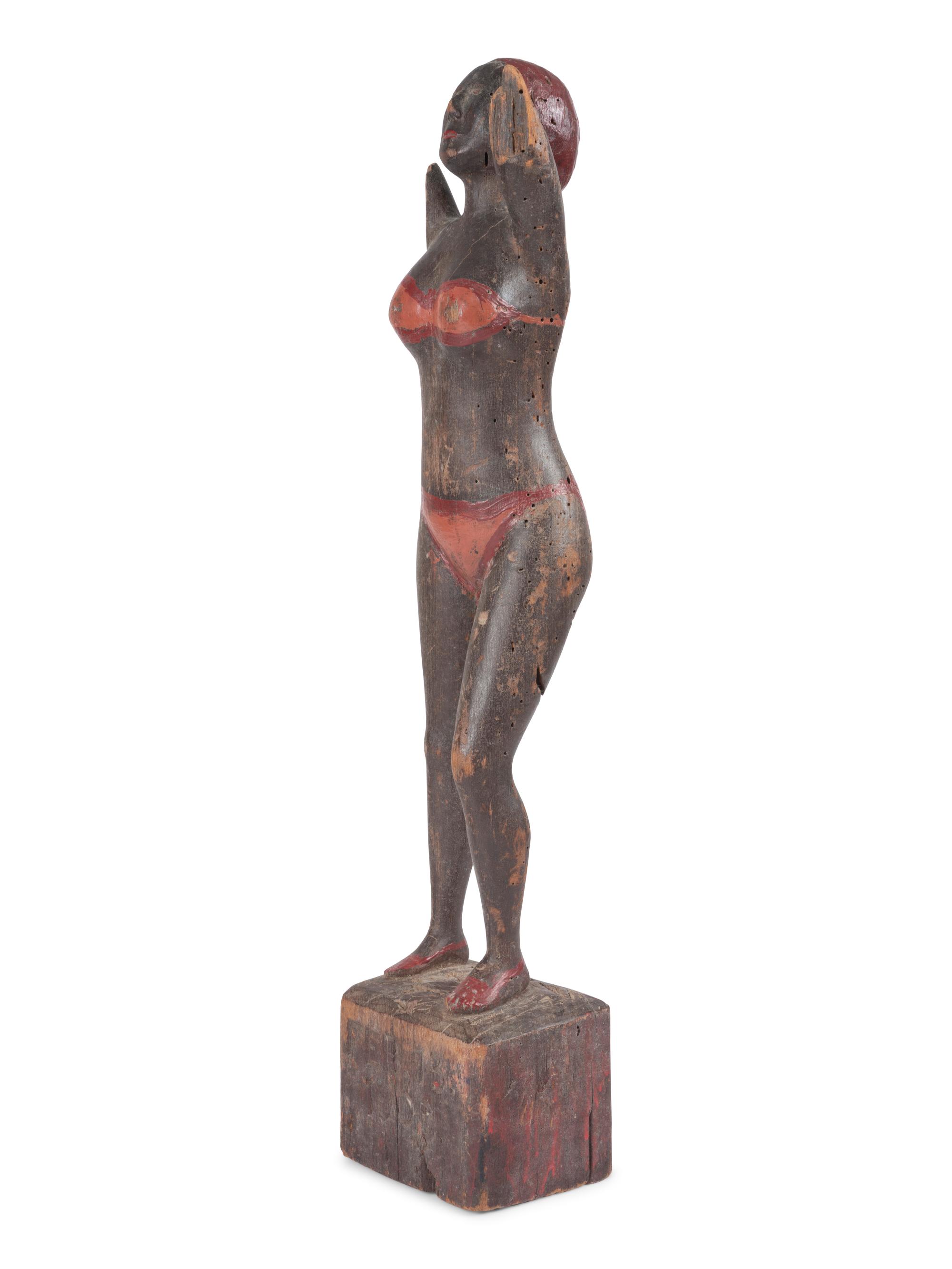A Carved and Painted Wood Bather Figure