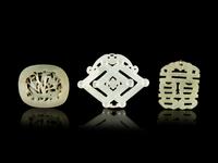 Three Carved Jade Pendants