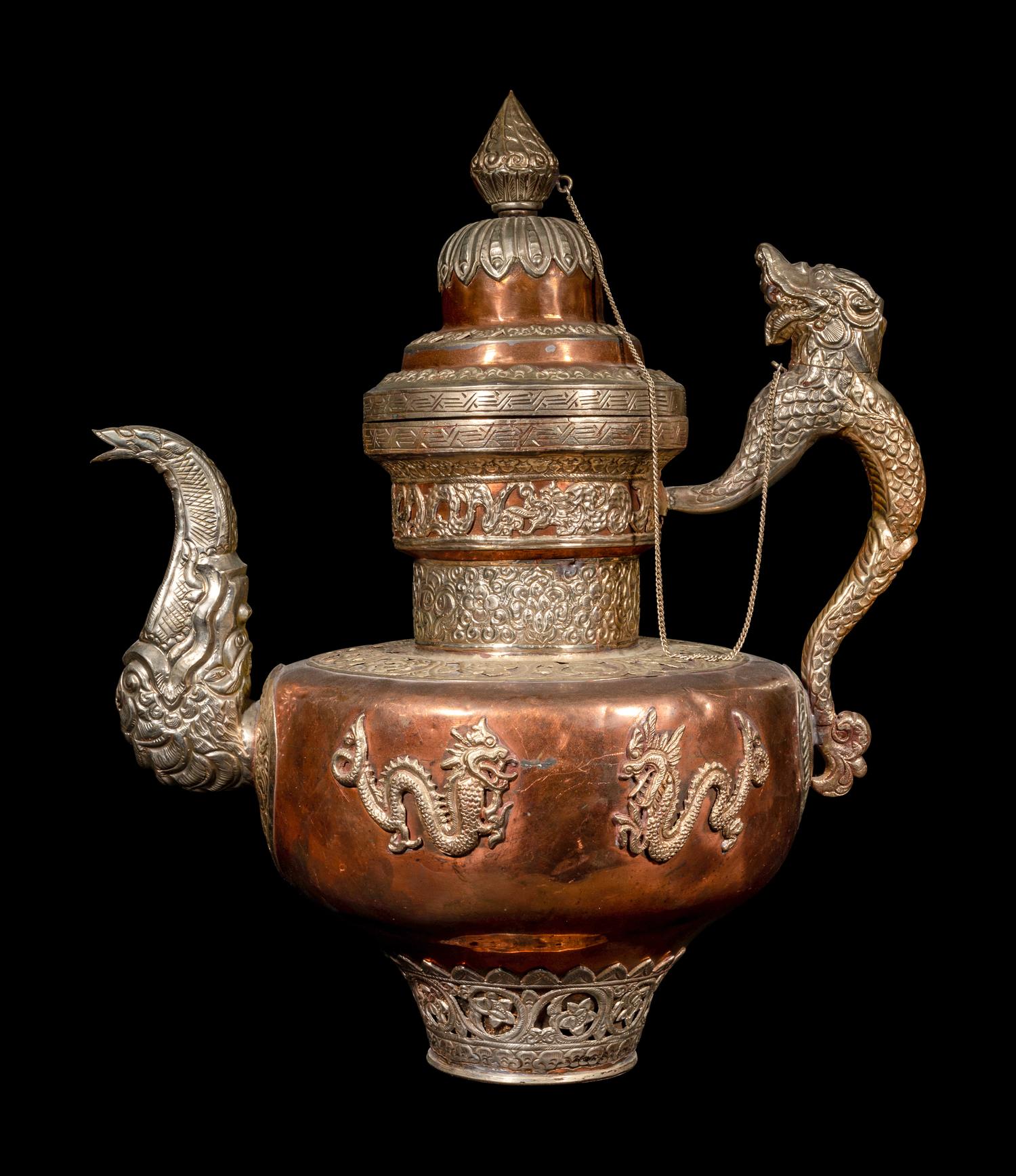 A Tibetan Silver and Copper Covered Ewer and A Chinese Bronze Pitcher