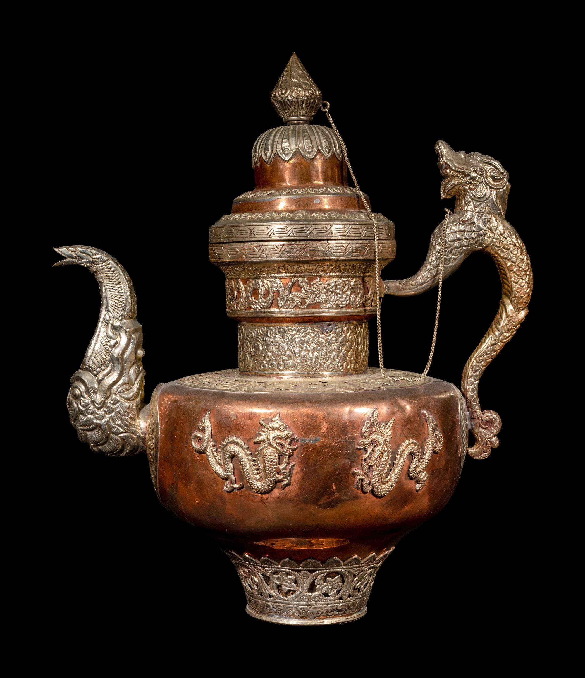 A Tibetan Silver and Copper Covered Ewer and A Chinese Bronze Pitcher