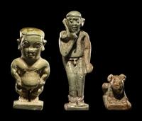 Three Egyptian Faience Amulets Including a Pataikos, a Harpocrates, and a Recumbent Lion