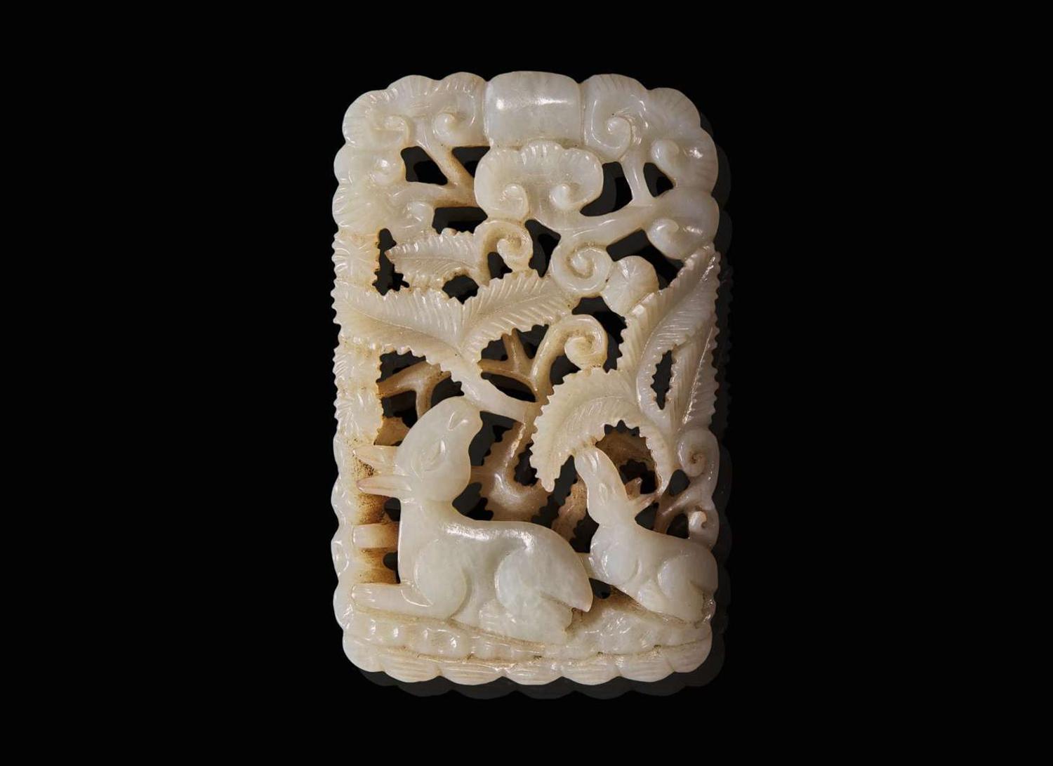A Chinese carved white jade "Deer" fudiao plaque, possibly Ming dynasty 白玉浮雕牌飾 可能為明