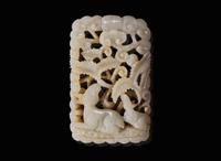 A Chinese carved white jade "Deer" fudiao plaque, possibly Ming dynasty 白玉浮雕牌飾 可能為明