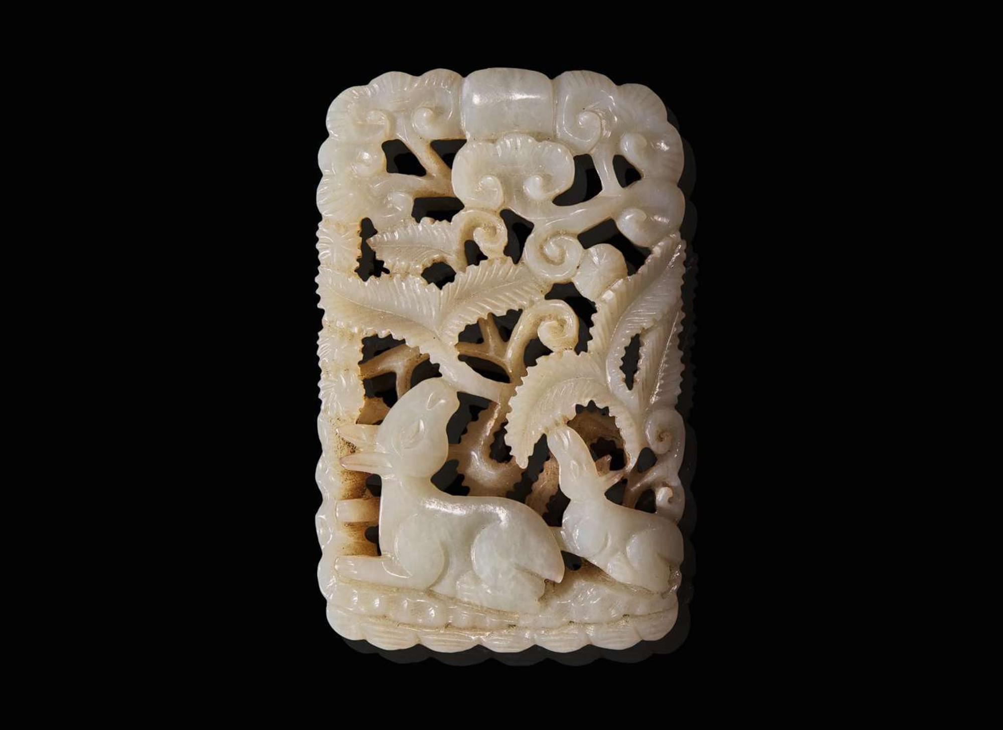 A Chinese carved white jade "Deer" fudiao plaque, possibly Ming dynasty 白玉浮雕牌飾 可能為明