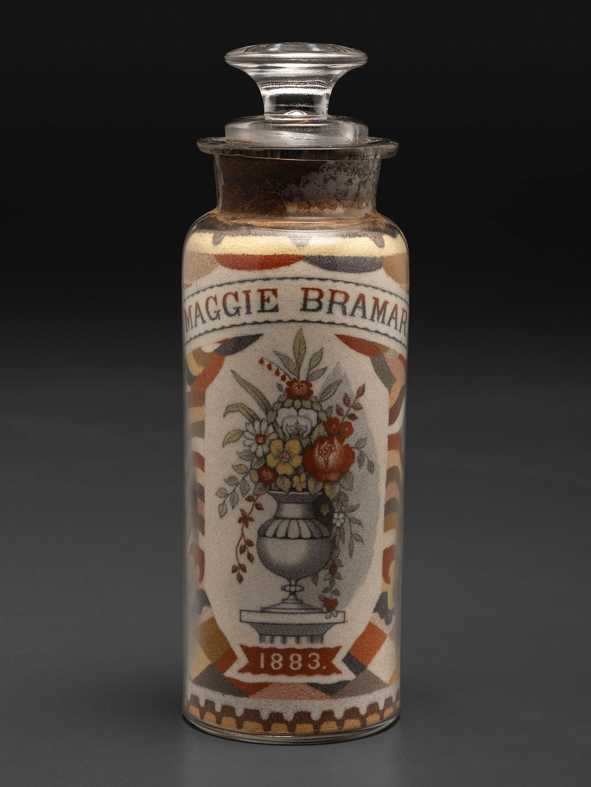 A Pair of Andrew Clemens (American, 1857-1894) 'Sweetheart' Sand Bottles