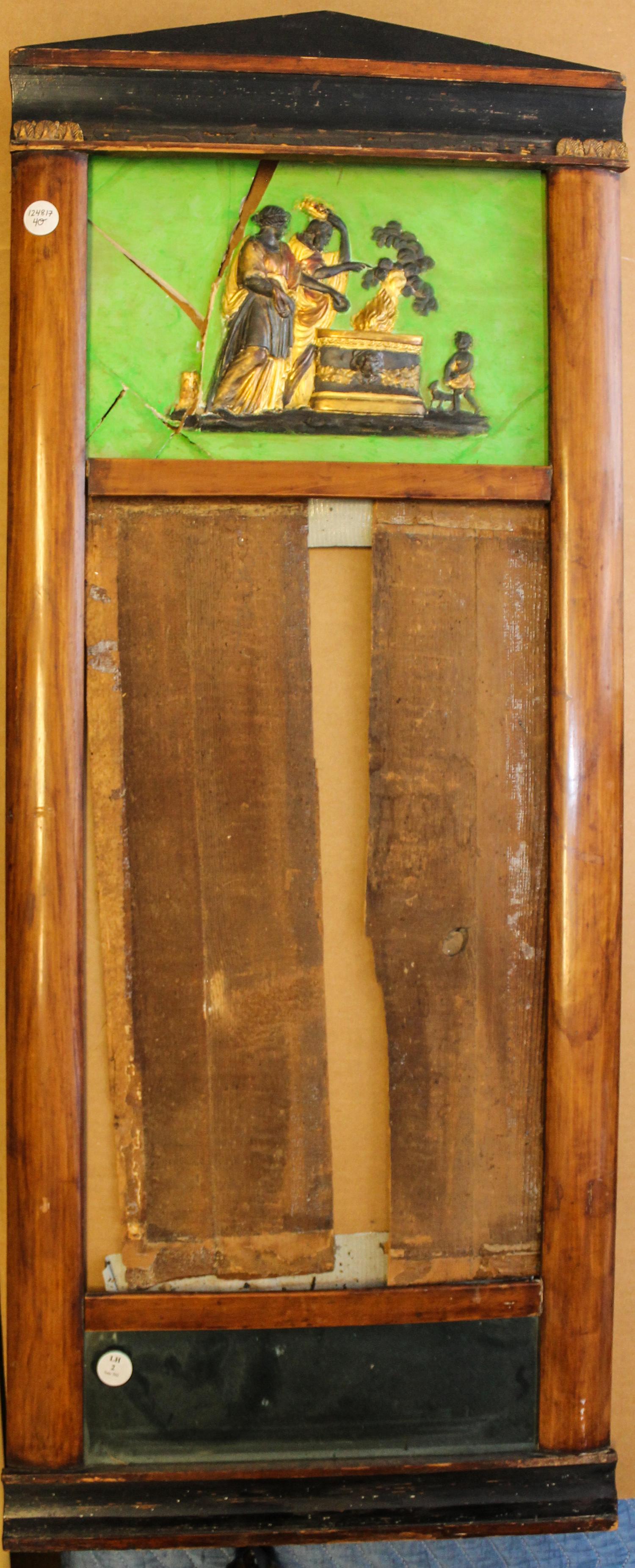 A Biedermeier Parcel Ebonized Walnut Pier Mirror. Height 44 3/4 x width 18 1/4 inches.