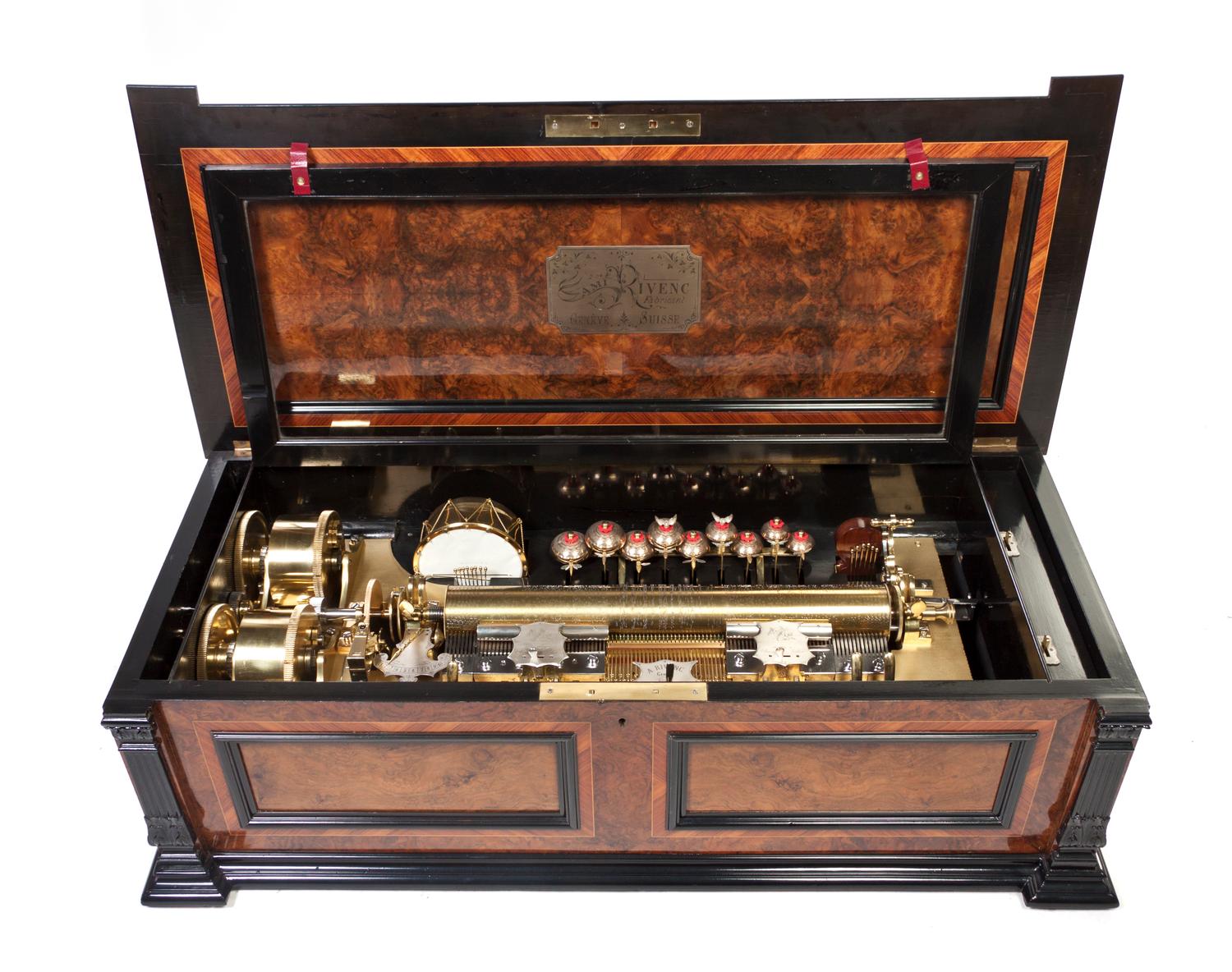 A Swiss Burlwood and Ebonized Interchangeable Cylinder Music Box with Cabinet, Ami Rivenc, Height 48 x width 38 x depth 28 inches.