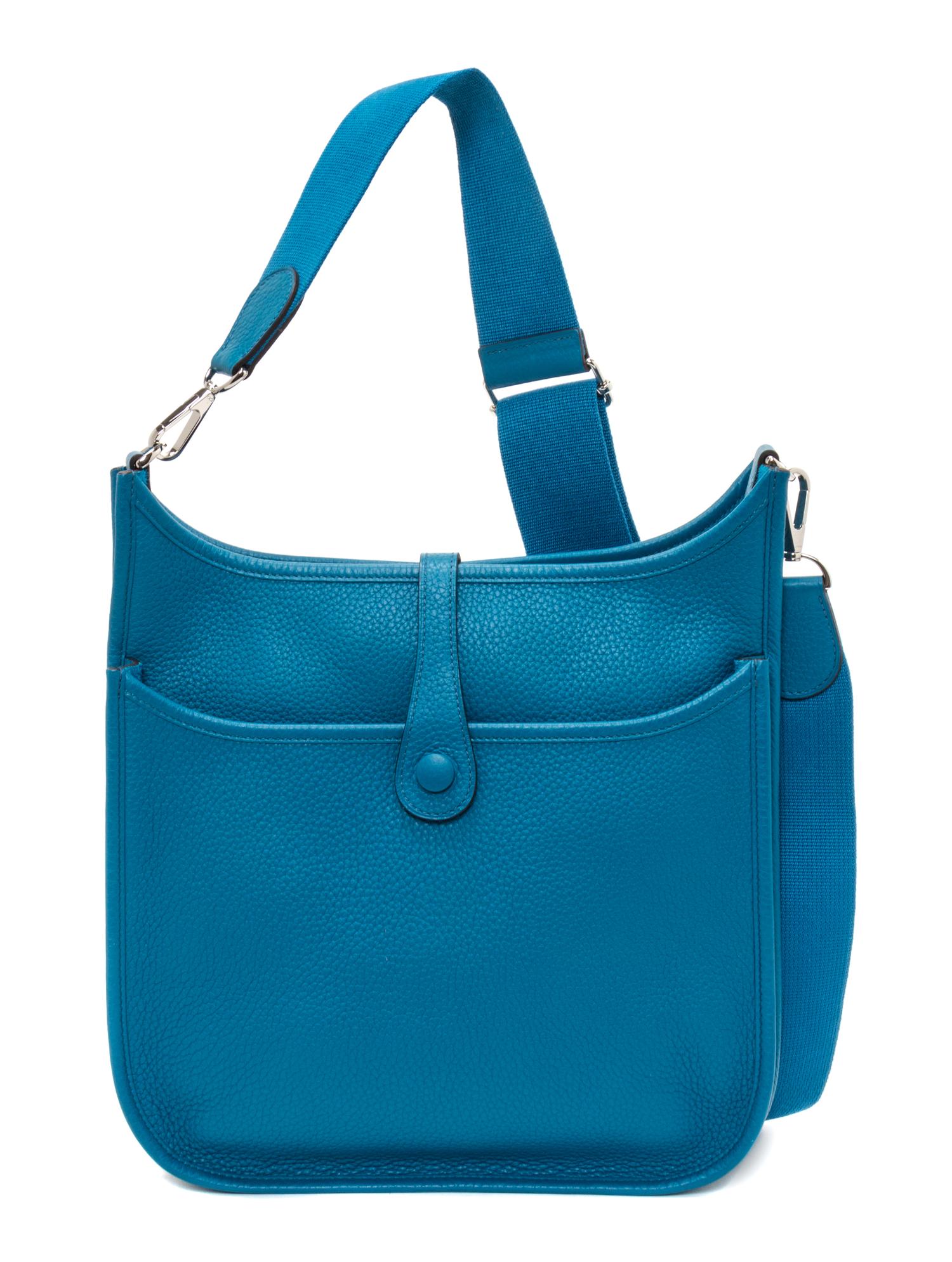An Hermes Bleu Izmir Taurillon Clemence Evelyne III PM Handbag, 11.25" x 12" x 2.5".