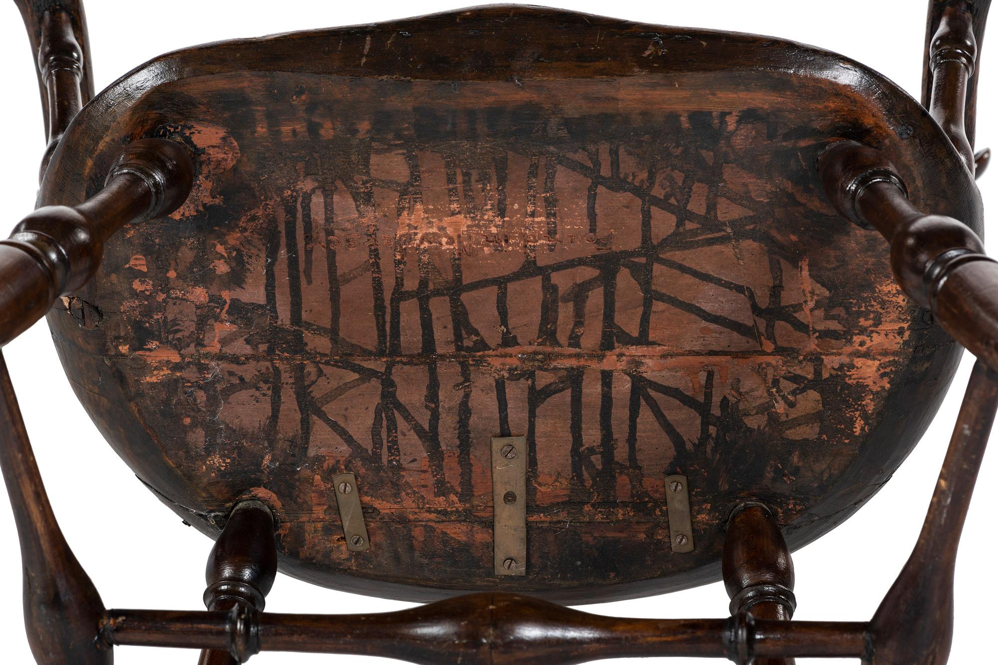 A Volute Carved Comb-Back Knuckle-Arm Windsor Armchair