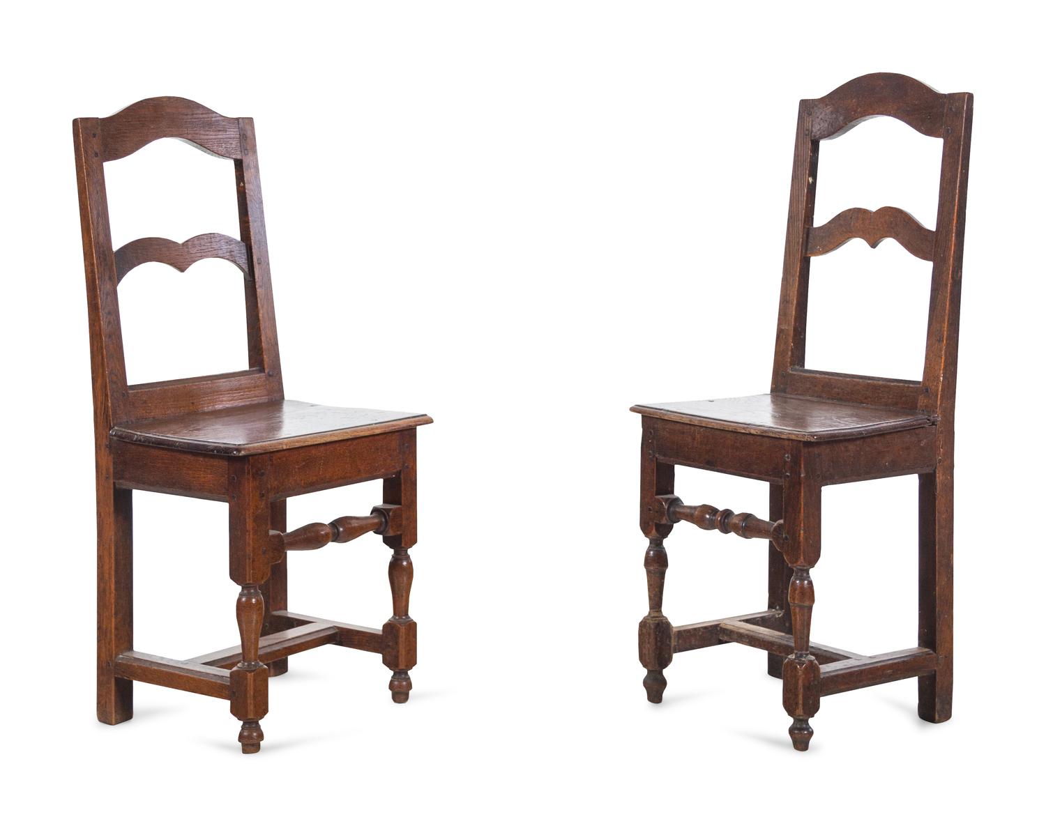 A Near Pair of Provincial Oak Chairs with Plank Seats