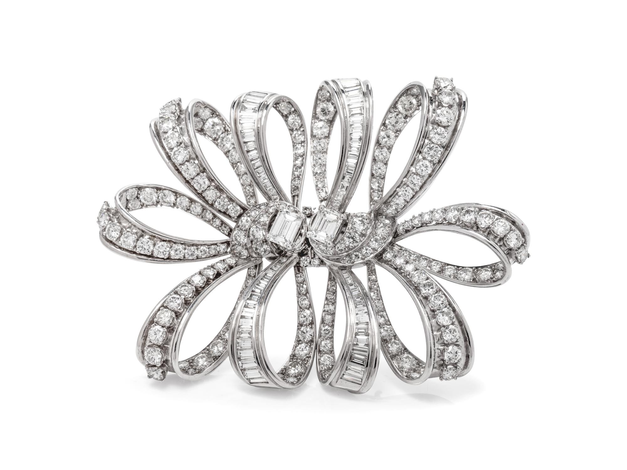 A Platinum and Diamond Double Bow Brooch,