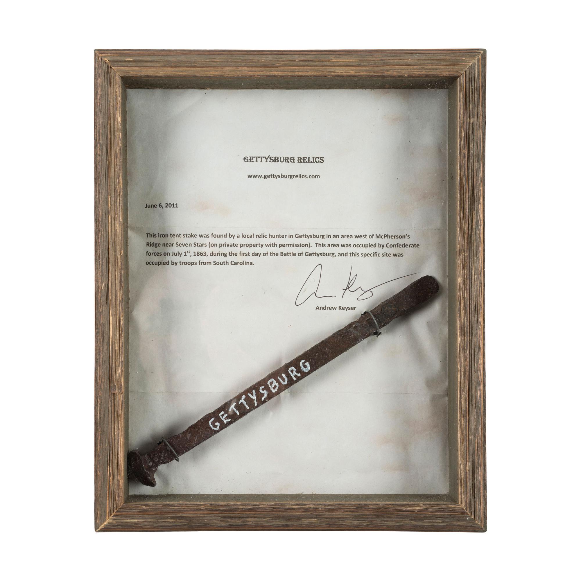 [CIVIL WAR]. Pair of relics including tent stake and 1863 "Union Forever" token.