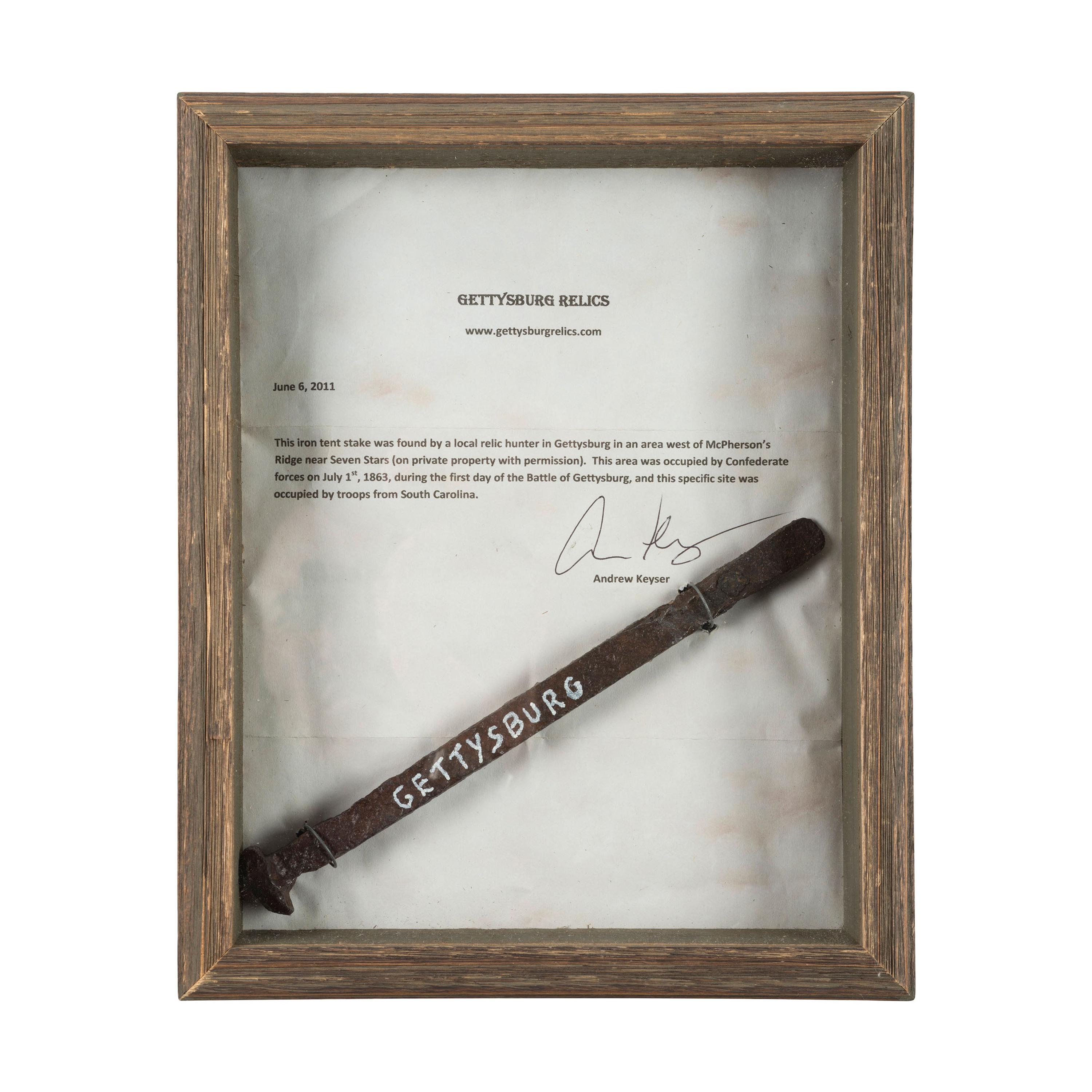 [CIVIL WAR]. Pair of relics including tent stake and 1863 "Union Forever" token.