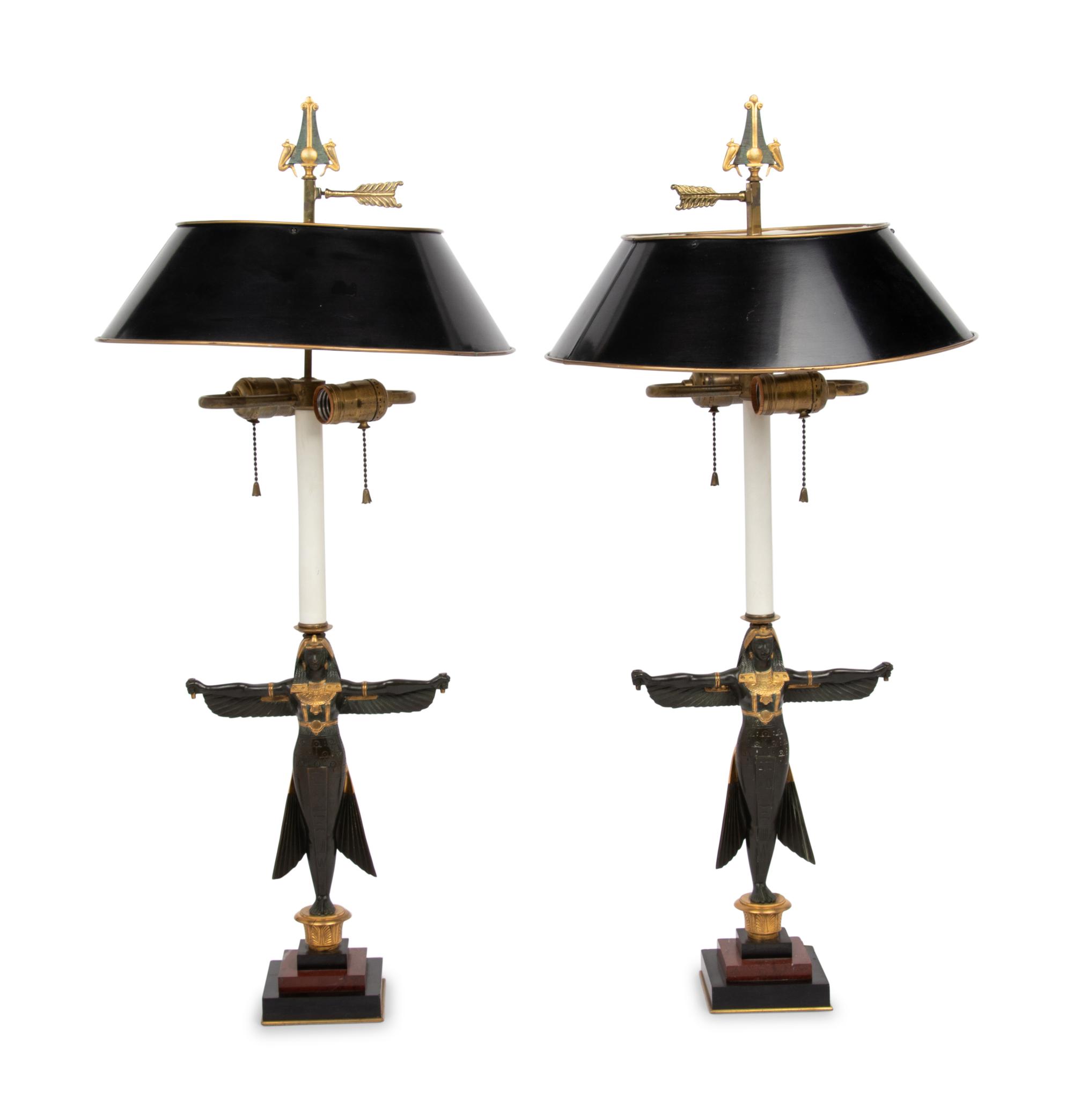 A Pair of Egyptian Revival Parcel Gilt Bronze Figures Mounted as Lamps with Tole Shades